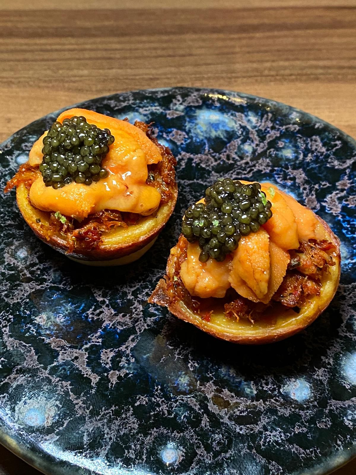 Kuih bakar berlauk with uni and oscietra caviar