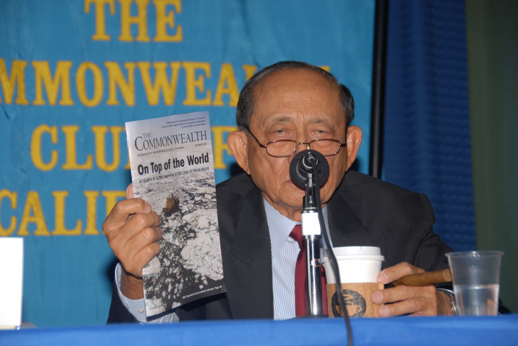 Former Philippine President Fidel V. Ramos holds up a copy of the October 2007 issue of The Commonwealth magazine (which features a special photo essay on global warming) while he makes a plea for attention to be paid to global warming by governments. The Philippines islands, he noted, are on the front line of experiencing the dangerous effects of climate change (Photo: John Zipperer.)