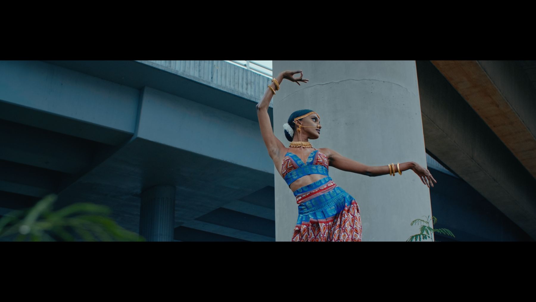 Image: A film still of Vanizha Vasanthanathan, Odissi dancer and Malaysian model, dancing on the set of Kegusaran