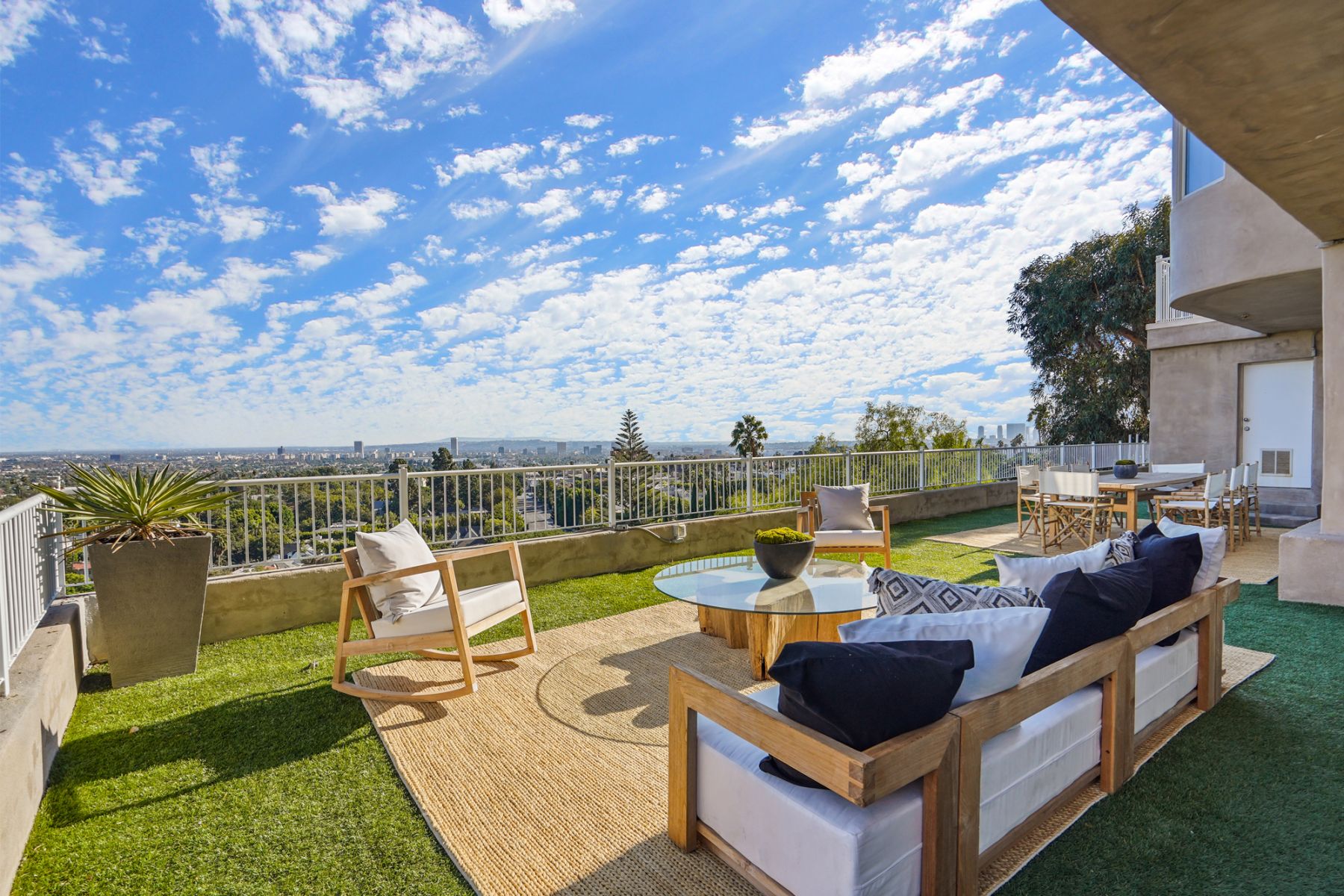 The large balcony is a stunning setting for al-fresco breakfast and dinner parties with friends and family (Photo: Jack Spitser, via TopTenRealEstateDeals.com)