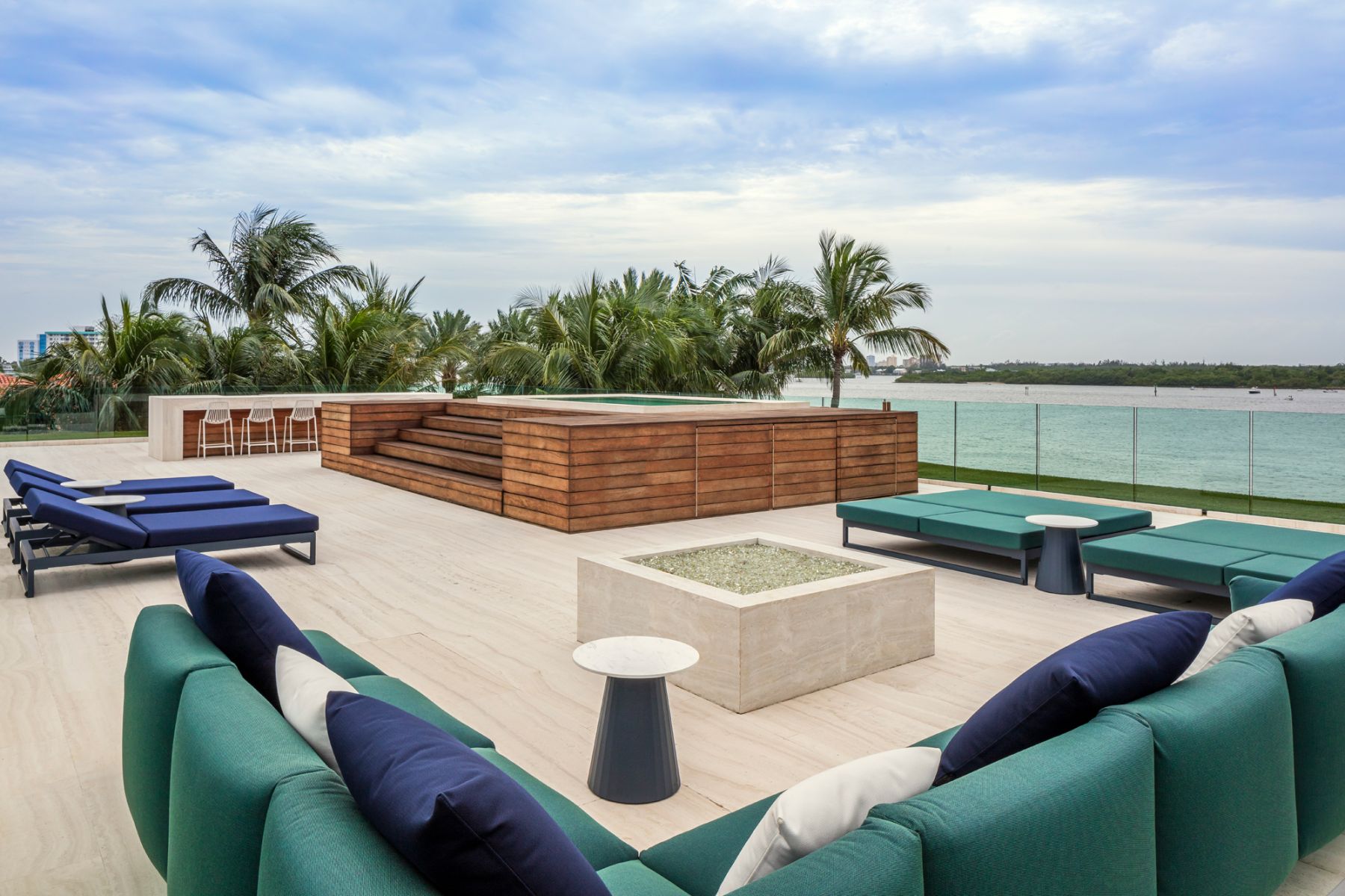 The open-plan rooftop terrace offers an expansive view of the Miami beach