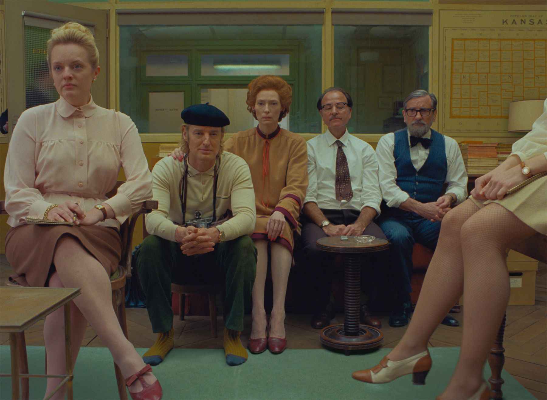 (From L-R): Elisabeth Moss, Owen Wilson, Tilda Swinton, Fisher Stevens and Griffin Dunne in the film THE FRENCH DISPATCH. Photo Courtesy of  Searchlight Pictures. Â© 2020 Twentieth Century Fox Film Corporation All Rights Reserved
