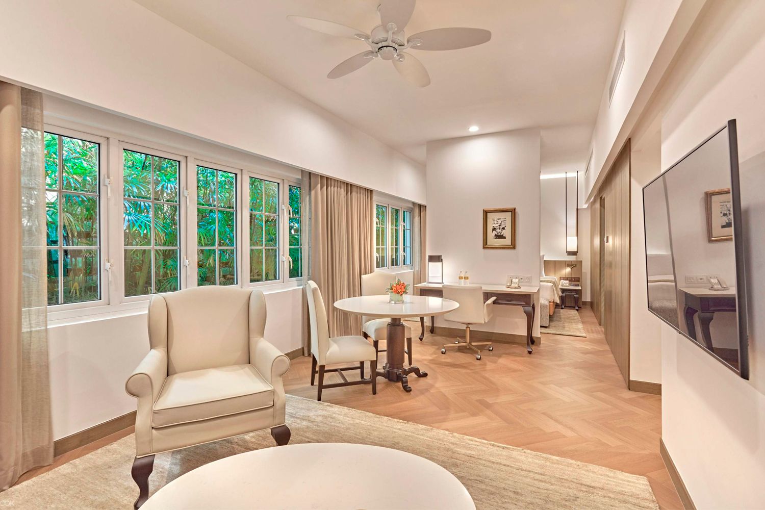 The poolside suite at Goodwood Park Hotel, which features natural materials and neutral tones (Image: Goodwood Park Hotel)