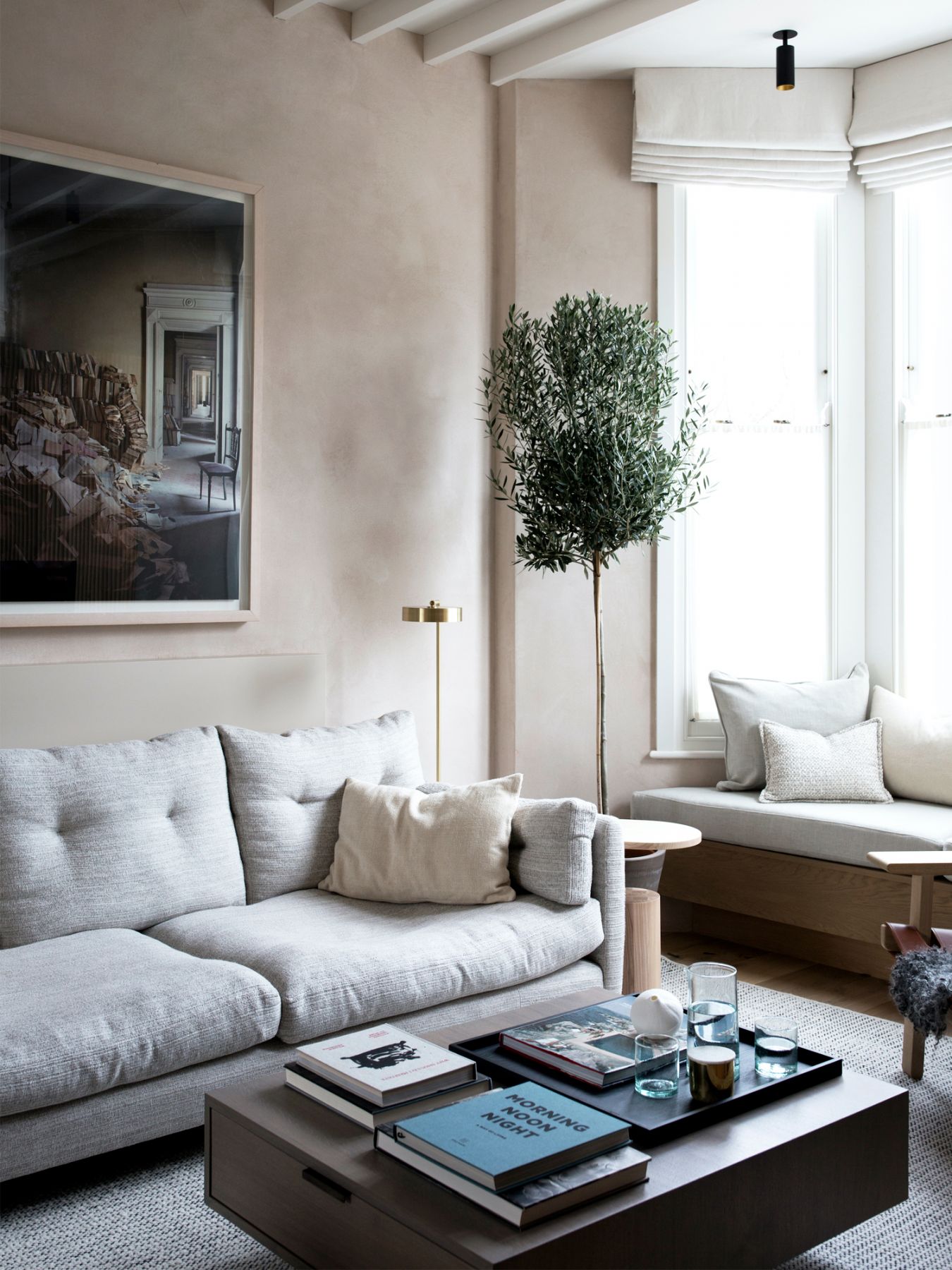 The light-filled living room is an elegant space with a serene atmosphere
