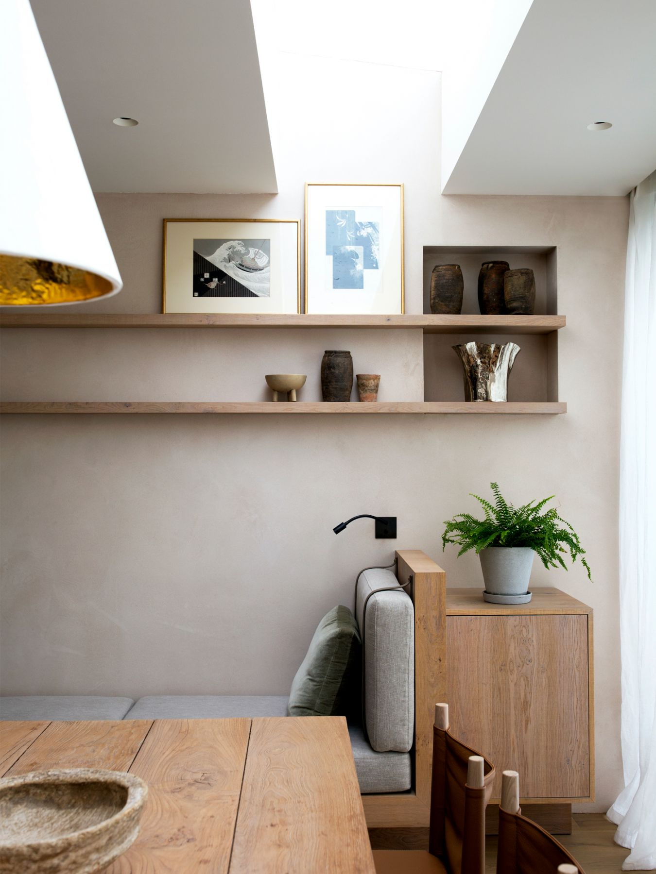 A custom daybed by TR Studio can be found in the dining room