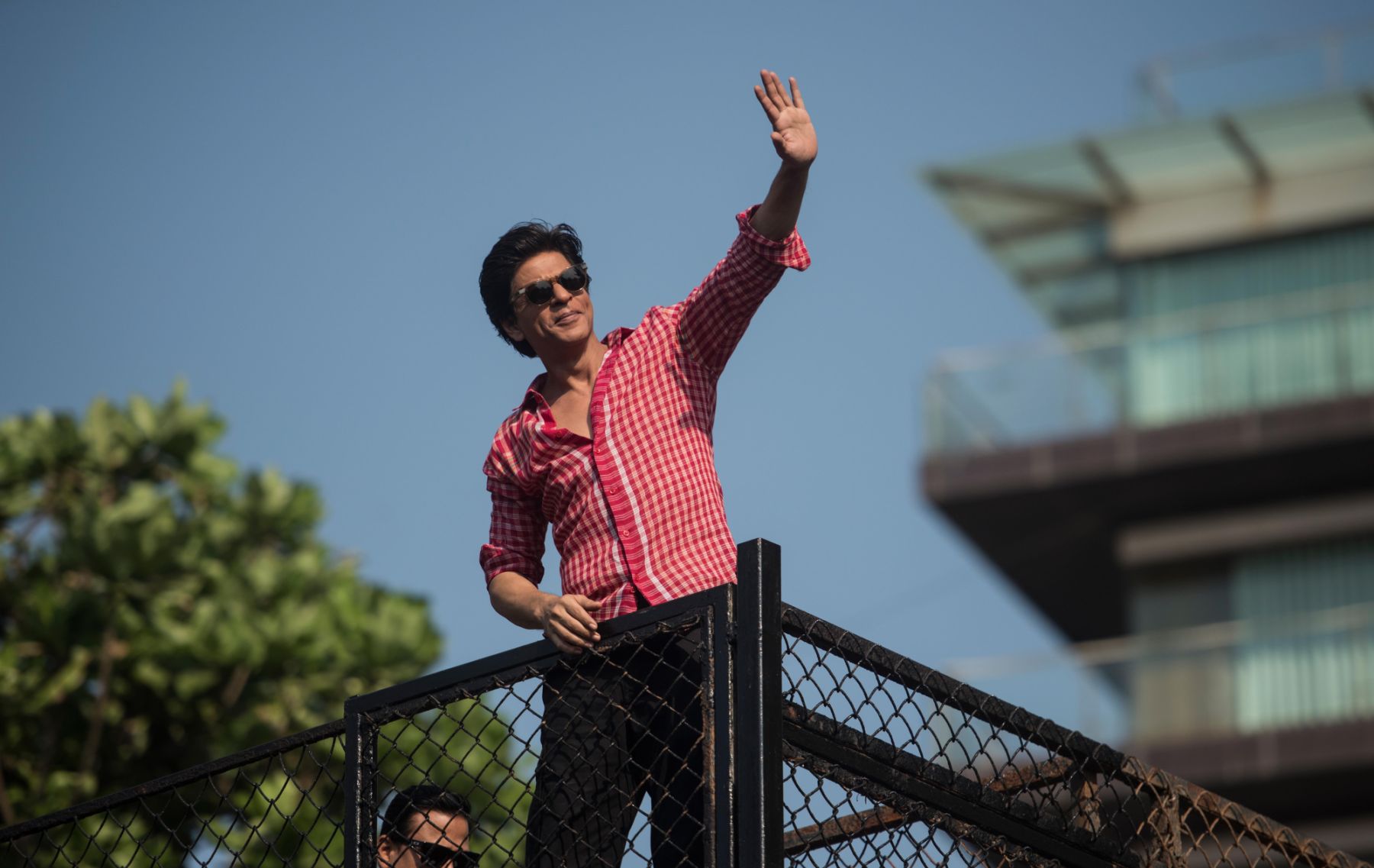 MUMBAI, INDIA - NOVEMBER 2: Bollywood actor Shah Rukh Khan celebrates his birthday at his residence Mannat, Bandra at Father Agnel, on November 2, 2018 in Mumbai, India. King Khan celebrated his 53rd birthday with his family members and took to his official Twitter handle to share sneak peeks from his birthday celebration. He also greeted thousands of fans outside his residence at midnight and thanked them for their love and wishes. (Photo by Satish Bate/Hindustan Times via Getty Images)