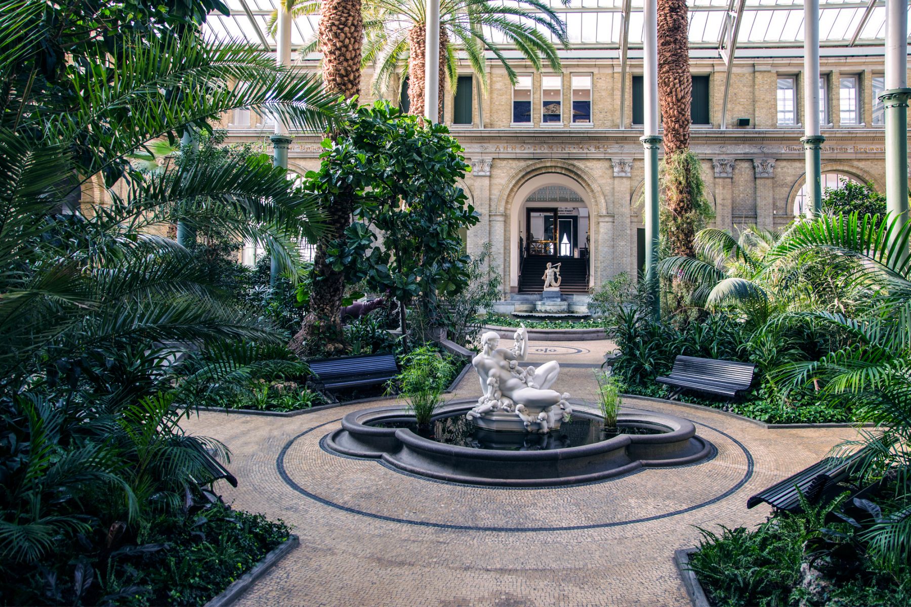 Tranquil outdoor areas showcase lush greenery and mesmerising statues (Image: Ny Carlsberg Glyptotek)