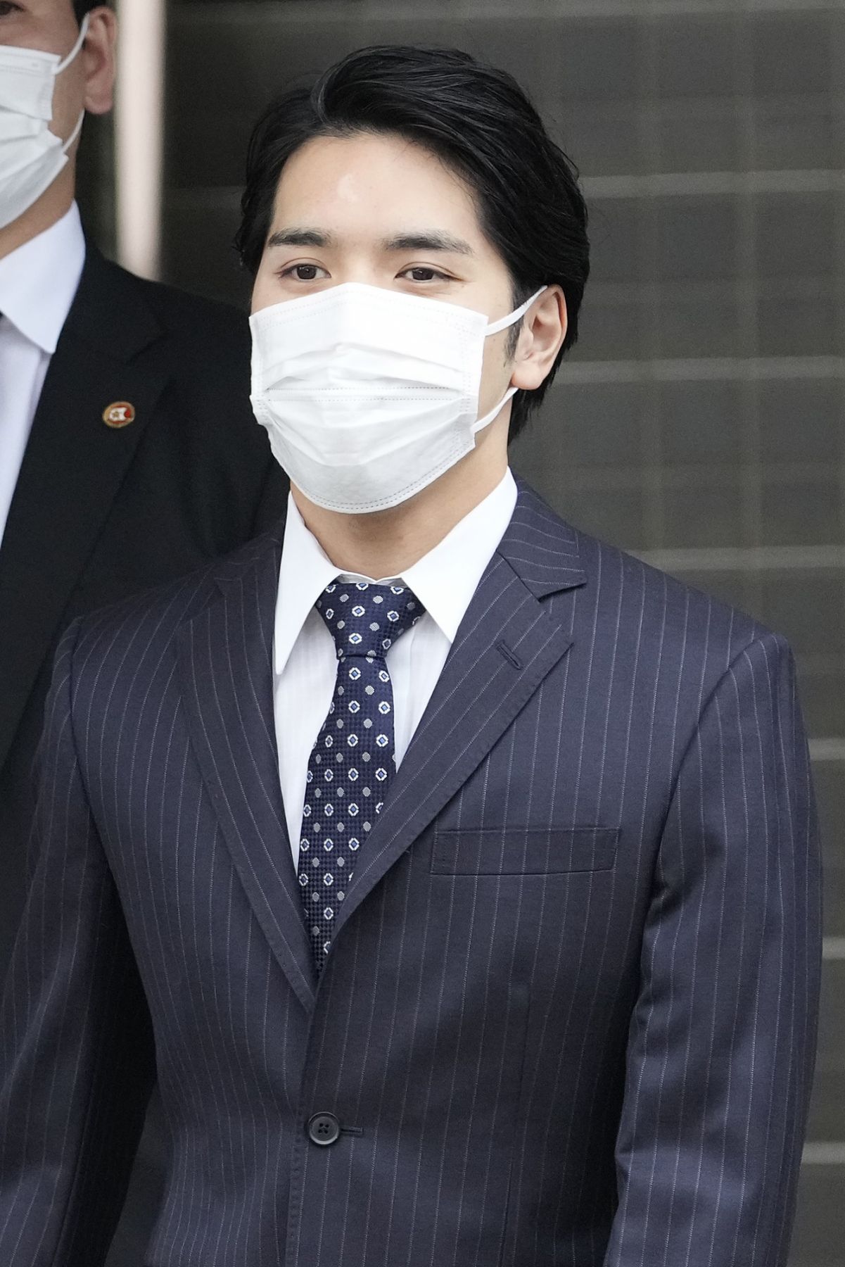 TOKYO, JAPAN - OCTOBER 26: Kei Komuro leaves his house on October 26, 2021 in Yokohama, Japan. Princess Mako is due to marry Kei Komuro today at a registry office following a relationship beset with controversy following the revelation that Mr Komuro's mother was embroiled in a financial dispute with a former fiancé. Following the wedding, Mako will renounce her royal entitlements and move with Komuro to New York. (Photo by Ken Ishii/Getty Images)