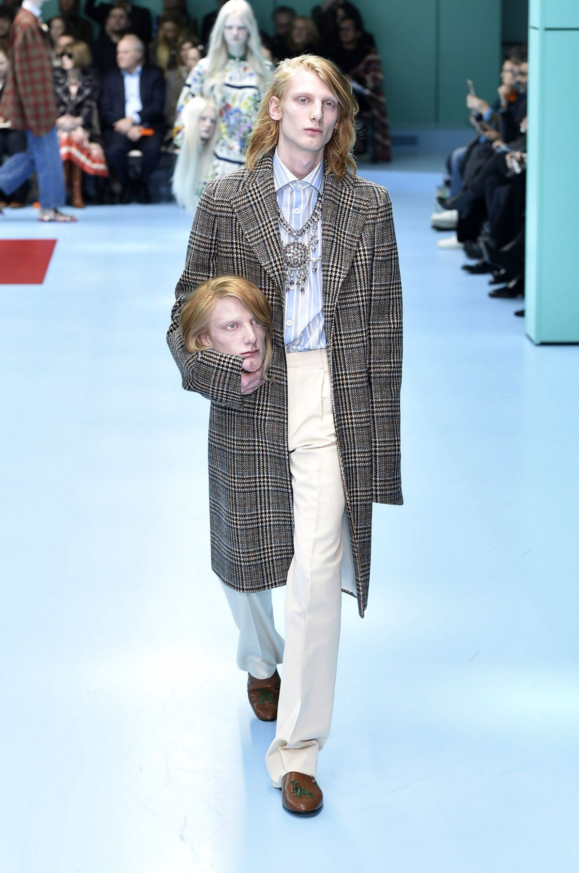 MILAN, ITALY - FEBRUARY 21: A model walks the runway at the Gucci Autumn Winter 2018 fashion show during Milan Fashion Week on February 21, 2018 in Milan, Italy. (Photo by Catwalking/Getty Images)