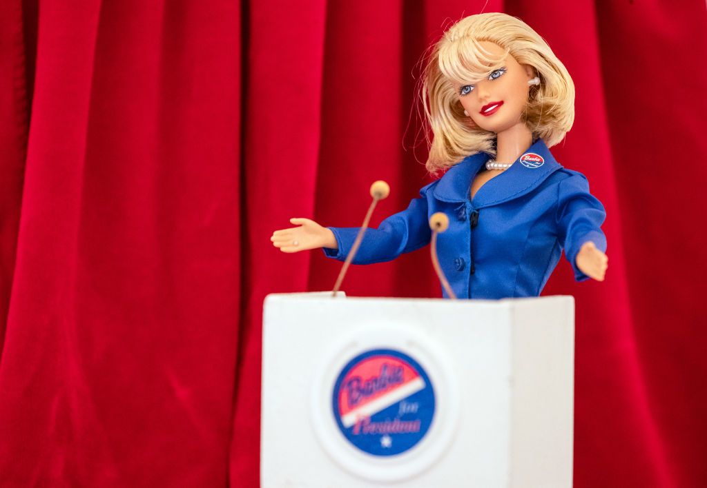 03 September 2020, Baden-Wuerttemberg, Bruchsal: ""Barbie for President"" is written in front of a Barbie doll at the special exhibition "Busy girl - Barbie makes a career" at Schloss Bruchsal. More than 1000 objects from the world's largest Barbie collection are presented. The exhibition can be seen from September 5 to February 21, 2021. Photo: Christoph Schmidt/dpa - ATTENTION: Only for editorial use in connection with a report on the exhibition and only with full mention of the above credit (Photo by Chr