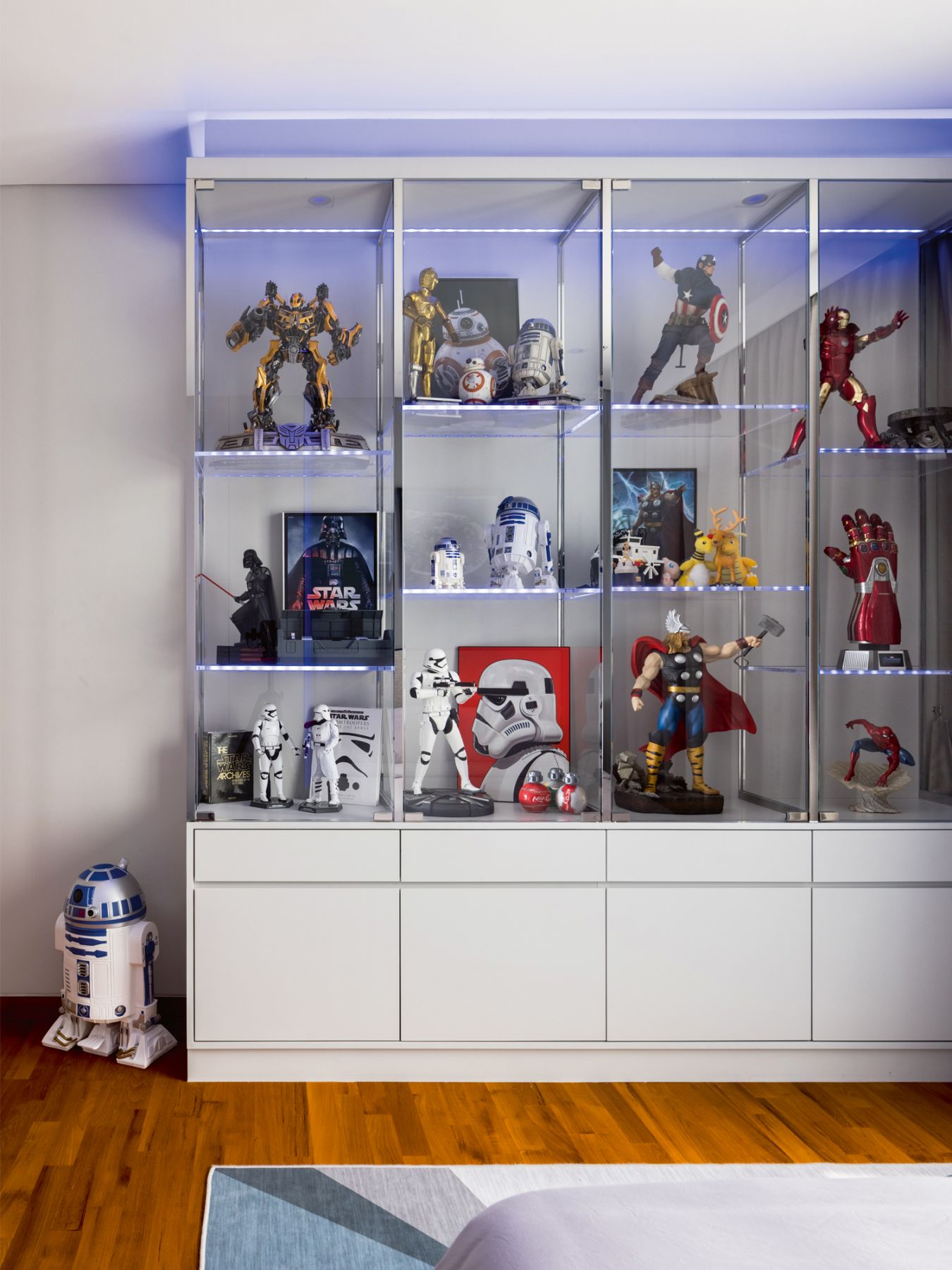 The shelves in the son’s bedroom were customised for his collection of action figures