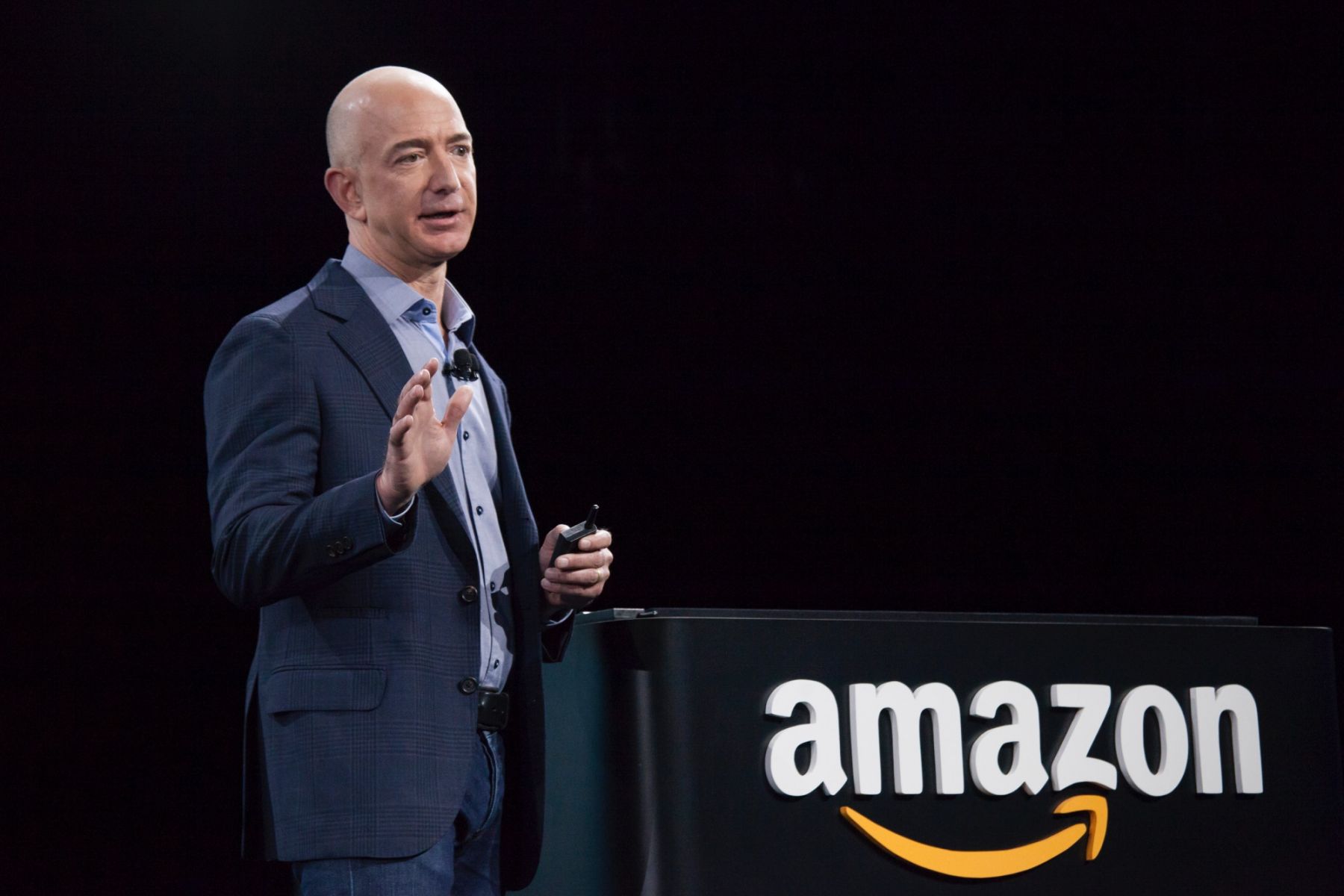 SEATTLE, WA - JUNE 18: Amazon.com founder and CEO Jeff Bezos presents the company's first smartphone, the Fire Phone, on June 18, 2014 in Seattle, Washington. The much-anticipated device is available for pre-order today and is available exclusively with AT&T service. (Photo by David Ryder/Getty Images)
