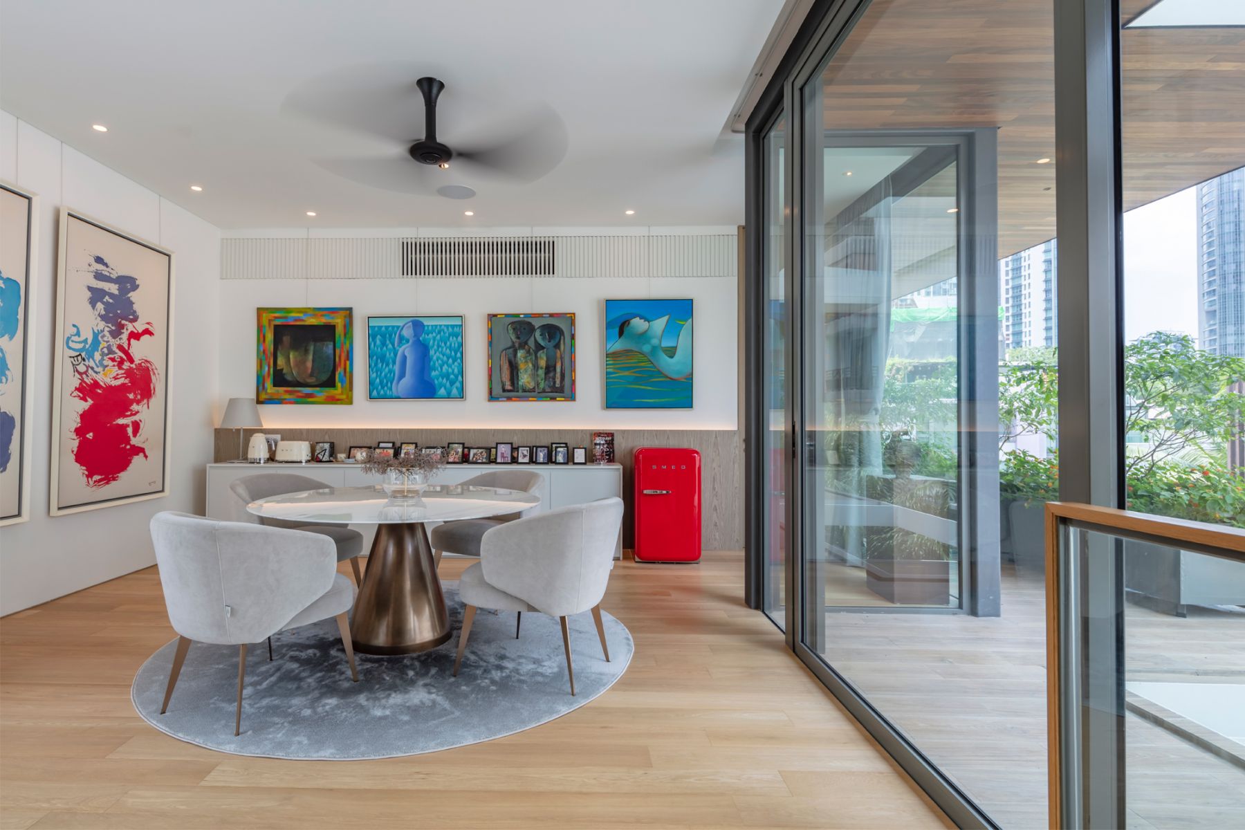 A cosy alternate communal area that comes alive with natural light and vibrant art