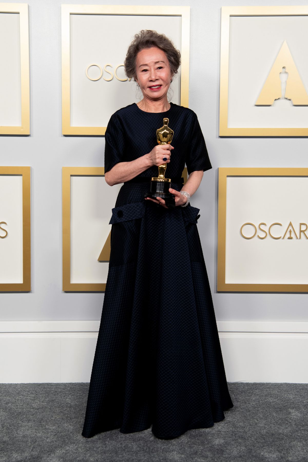 `LOS ANGELES, CALIFORNIA â APRIL 25: (EDITORIAL USE ONLY) In this handout photo provided by A.M.P.A.S., Yuh-Jung Youn, winner of Best Actress in a Supporting Role for "Minari," poses in the press room during the 93rd Annual Academy Awards at Union Station on April 25, 2021 in Los Angeles, California. (Photo by Matt Petit/A.M.P.A.S. via Getty Images)
