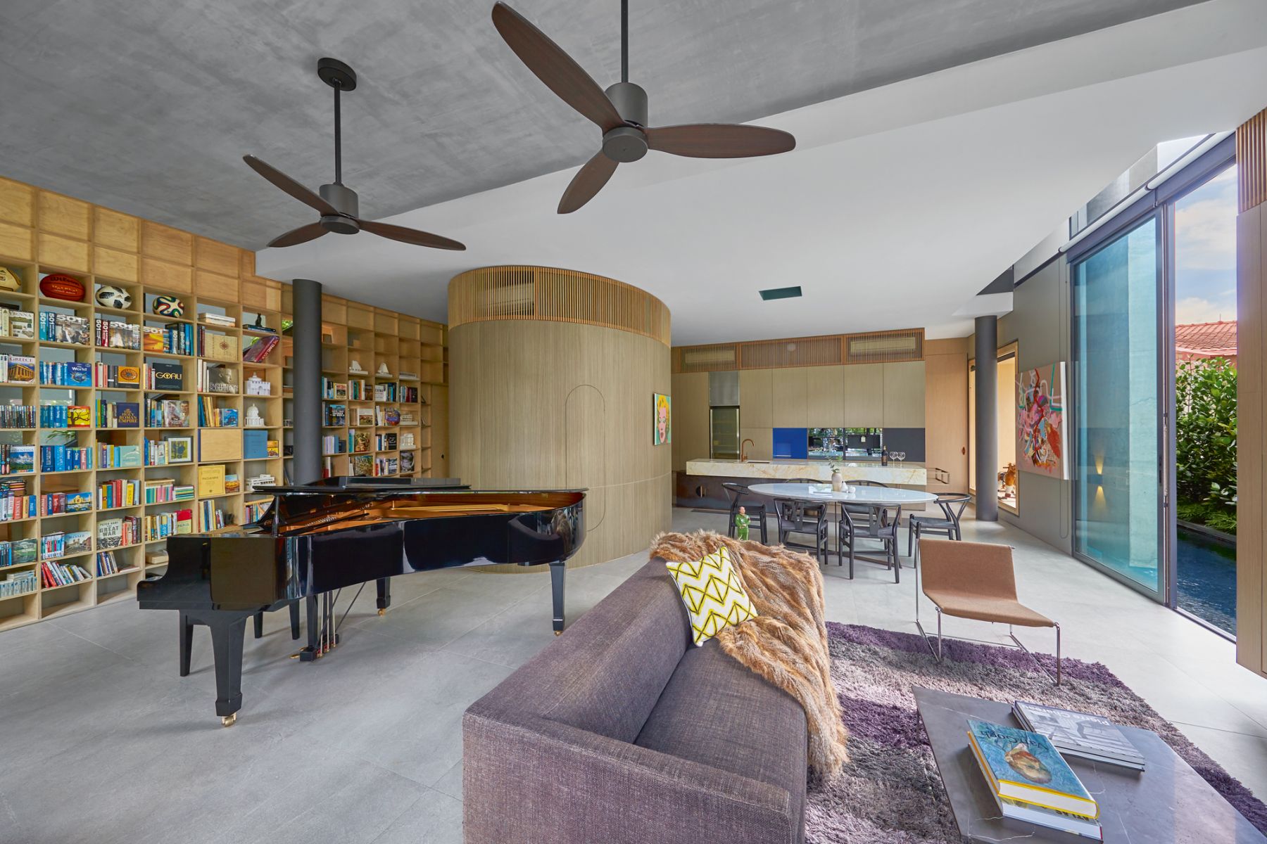 T+Q co-founder Rene Tan incorporates bookcases, shelves and other storage into discreetly designed panels throughout his family home
