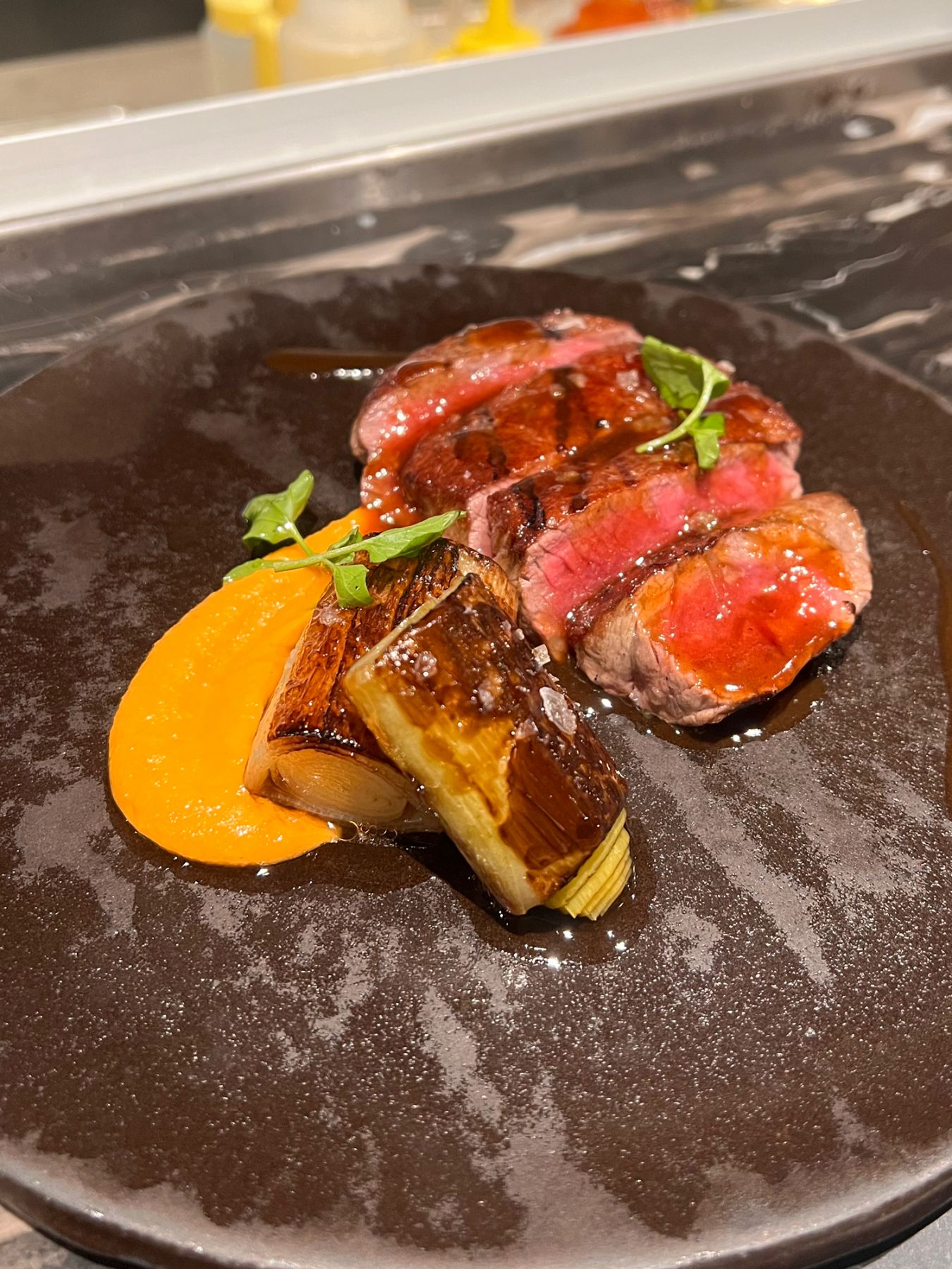 Grass-fed Australian Angus tenderloin with Catalan romesco sauce and charred leeks