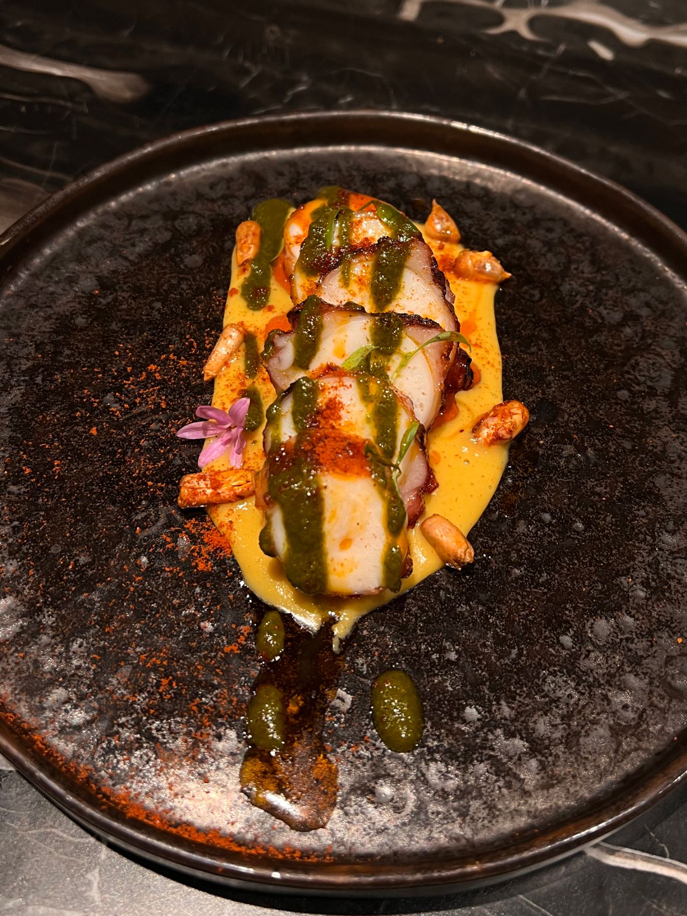 Grilled Spanish octopus sweet corn sauce, chimichurri, chorizo oil, canchita