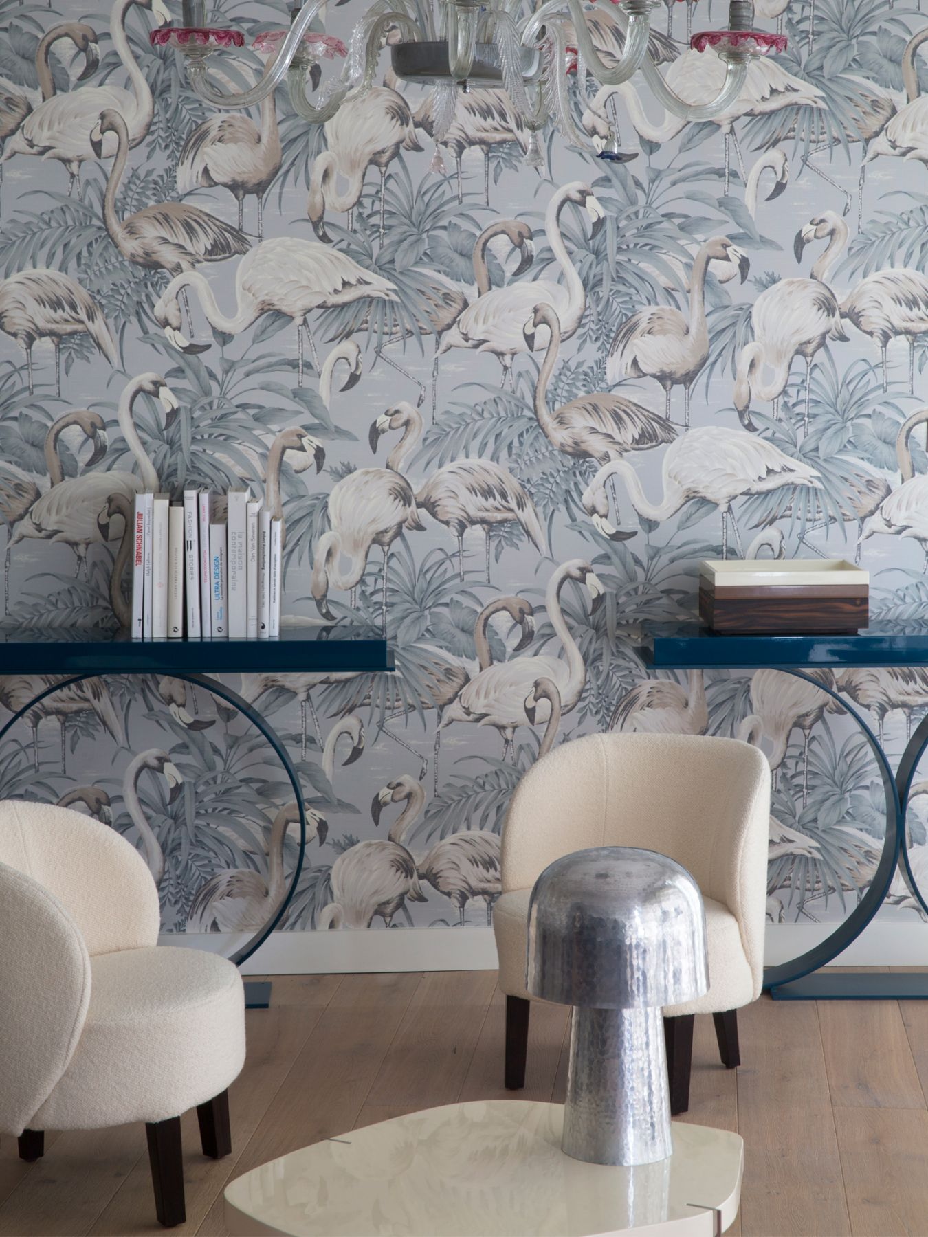 A wallpaper with flamingo motifs adds a graphic edge to one of the rooms designed by the studio (Photographed by Jean-Marc Palisse)