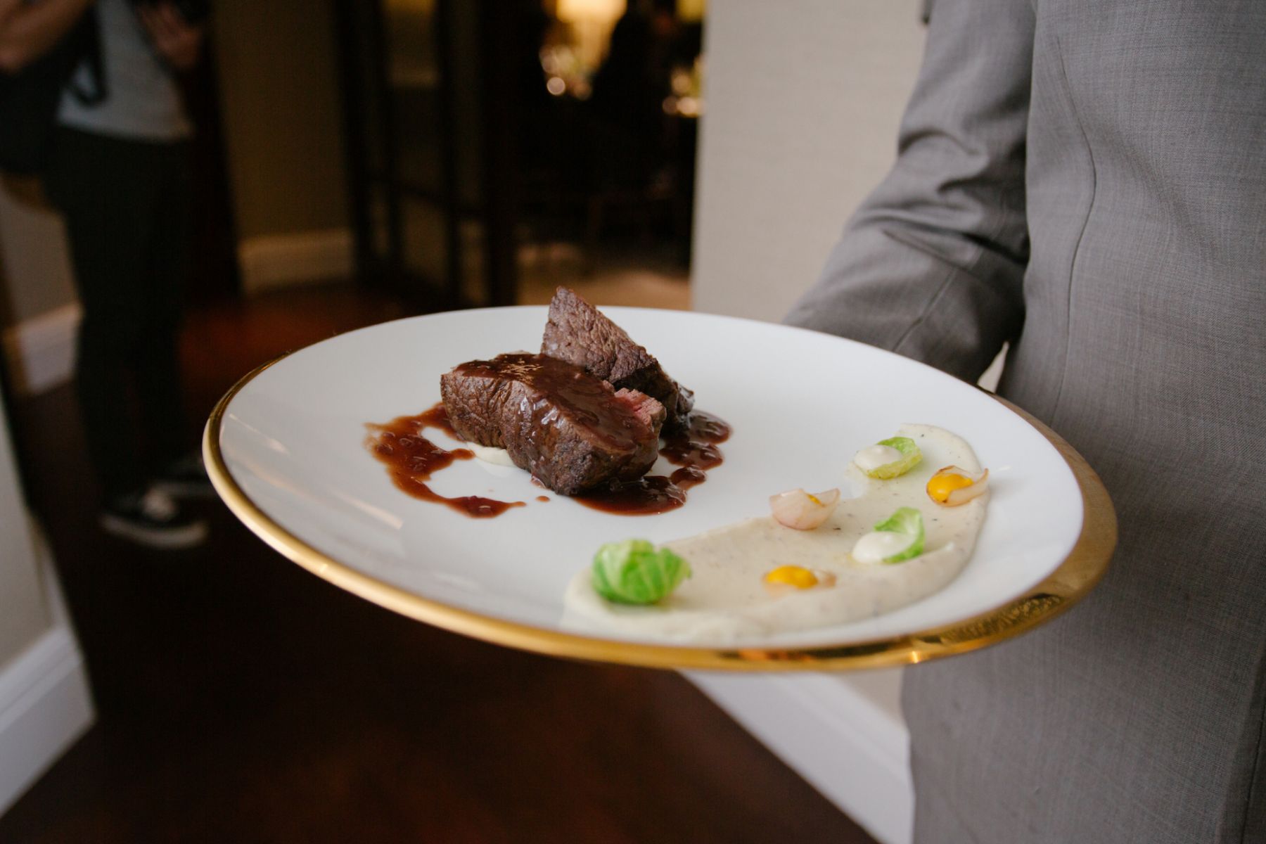 Beef tenderloin with truffle pottato mousseline, brussel sprout, pumpkin puree and bordelaise sauce