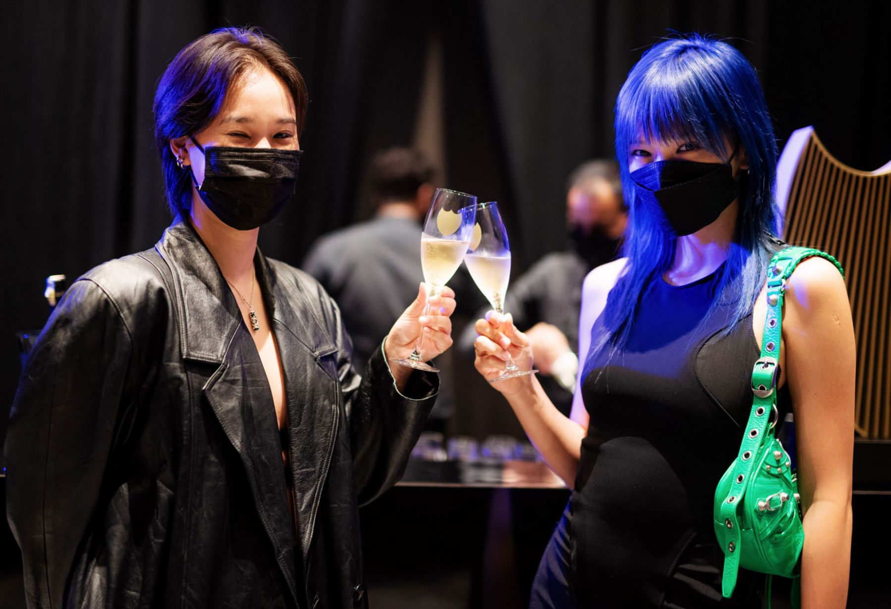 Clinking glasses of Dom Pérignon