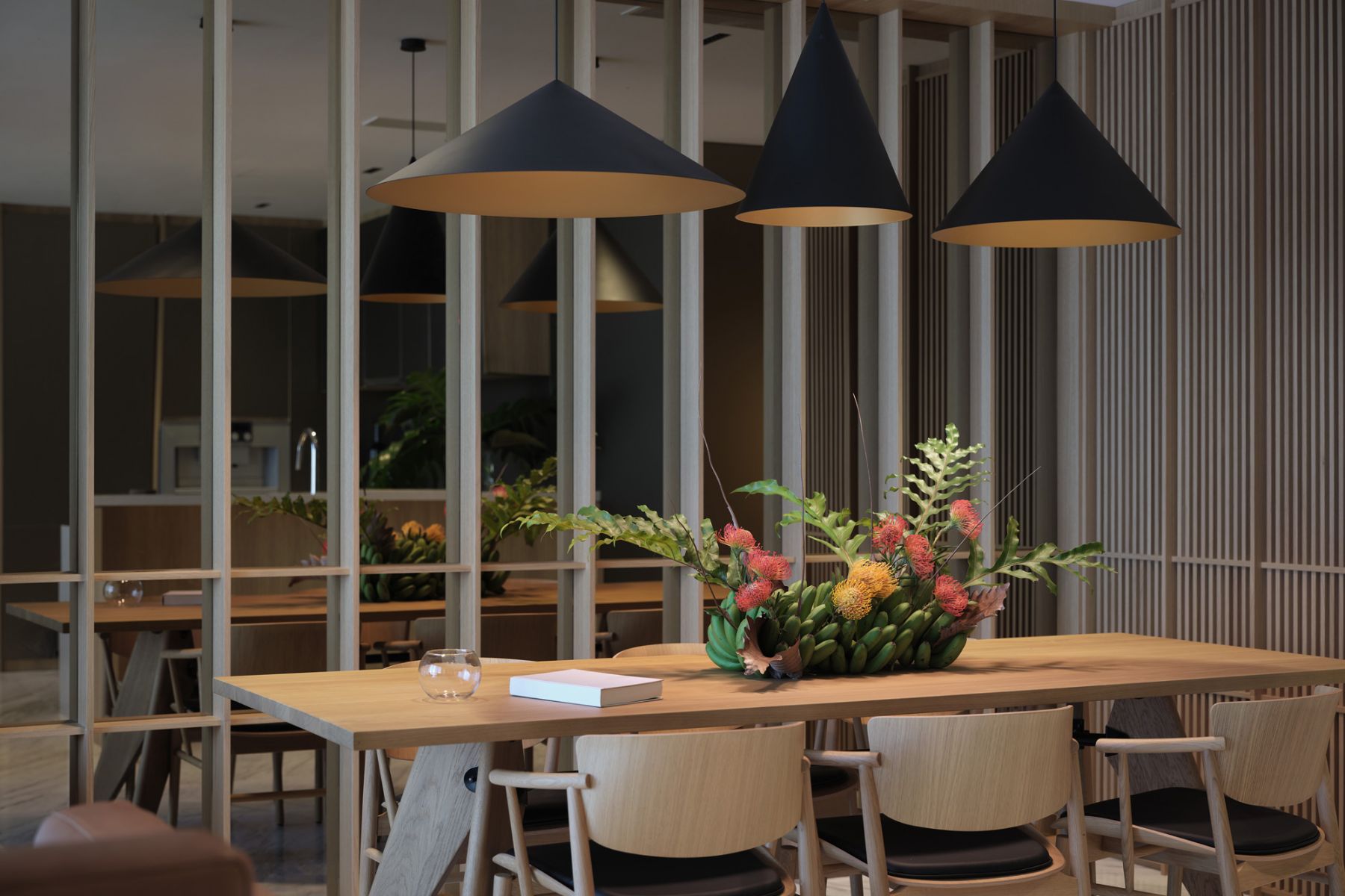 Mirrored panels in the dining room reflect a sense of sophistication