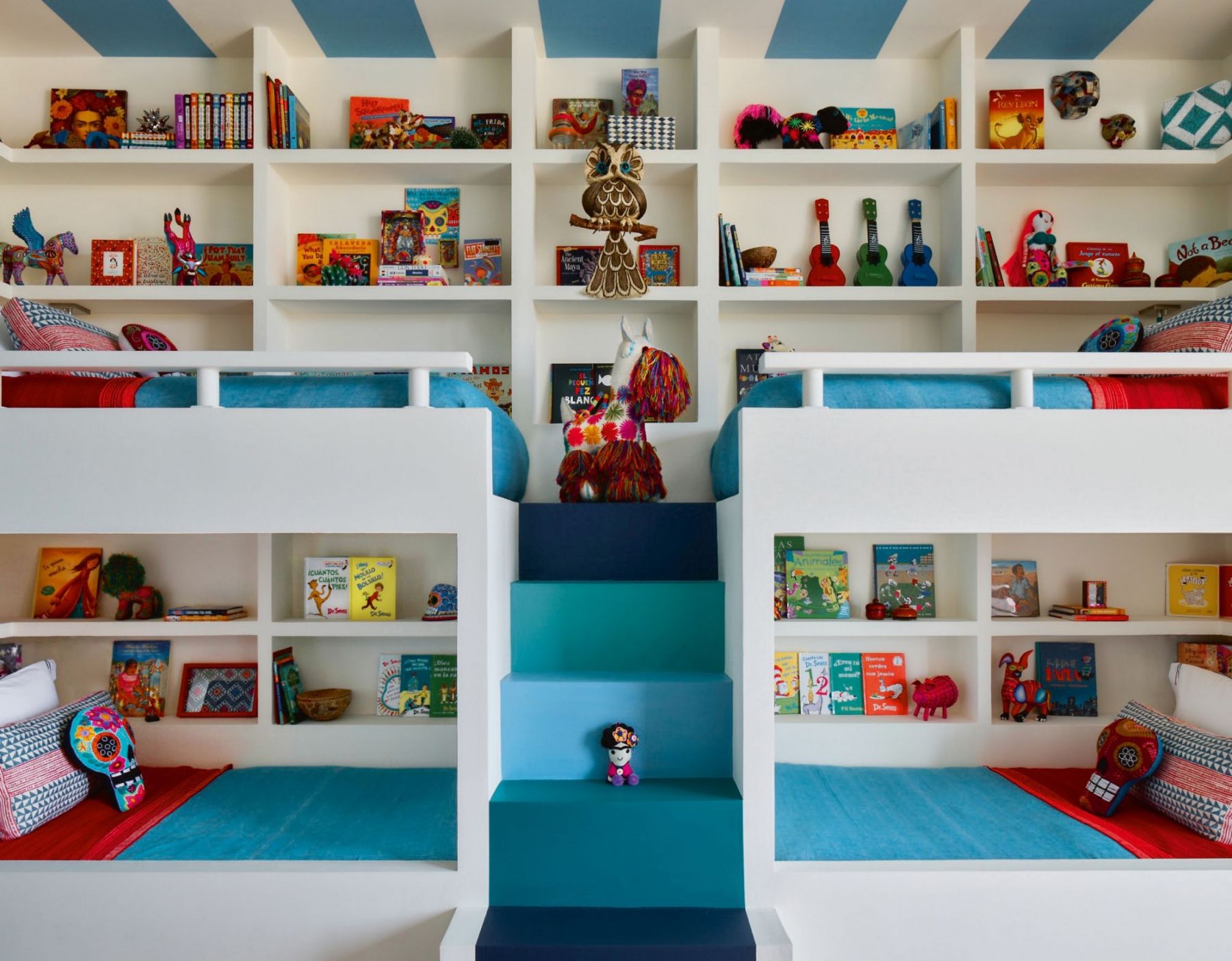 Martyn Lawrence Bullard used colourful decor and upholstery to create a vibrant room that can fit four kids