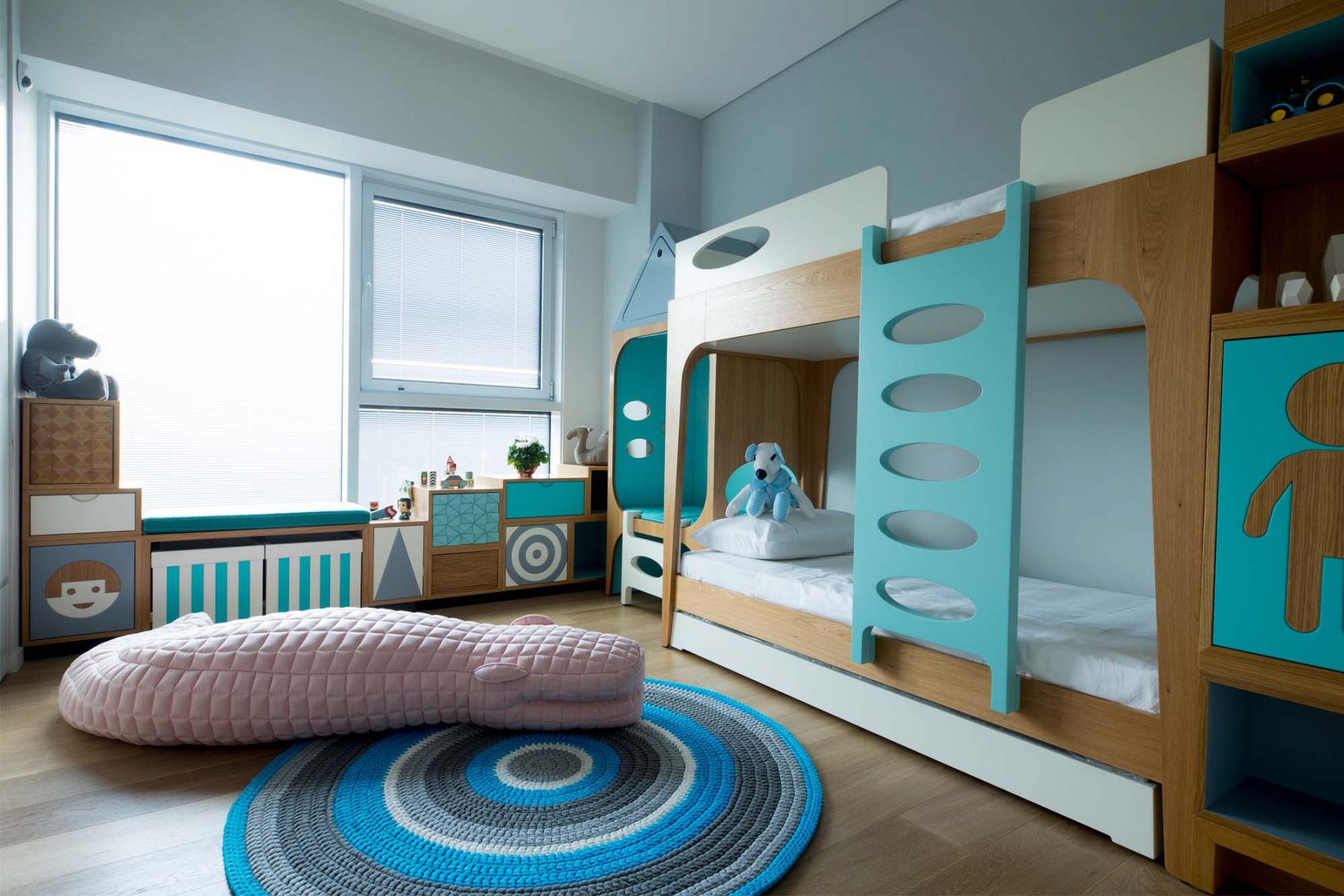 This stylish haven designed by Sarit Shani Hay features cool tones with wooden textures (Image: Sarit Shani Hay)