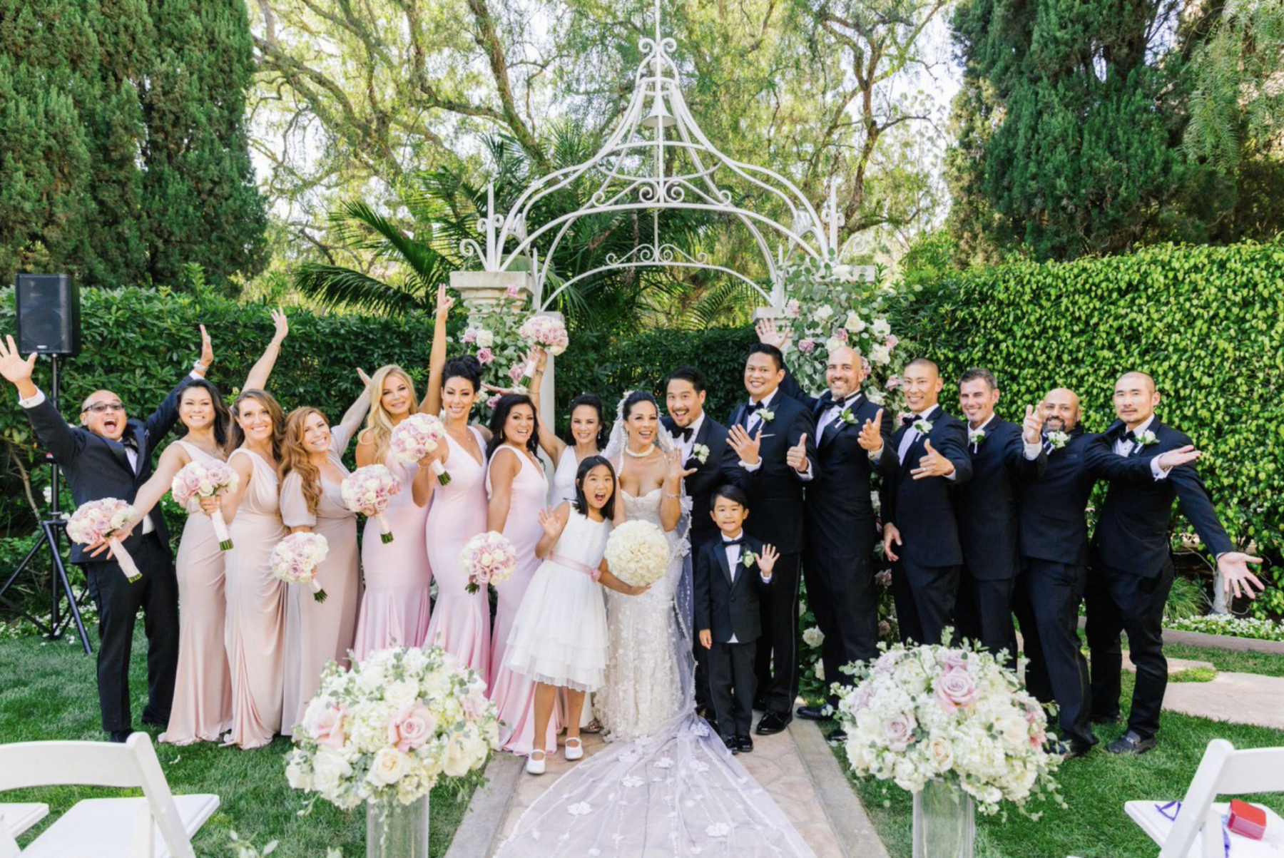 The couple with Eric Araya, Mikki Cajucom Sclafani, Maria Harris, Sarah Natasha Horowitz, Wendy Starland, Christine Pate, Dr Pier Santiago, Karen Borja, Melanie Oshima, Kenji Oshima, Manny Samaniego, Simon Halff, Travis Tam, Chad Gessen, Amir Sanjar, Seung Lee