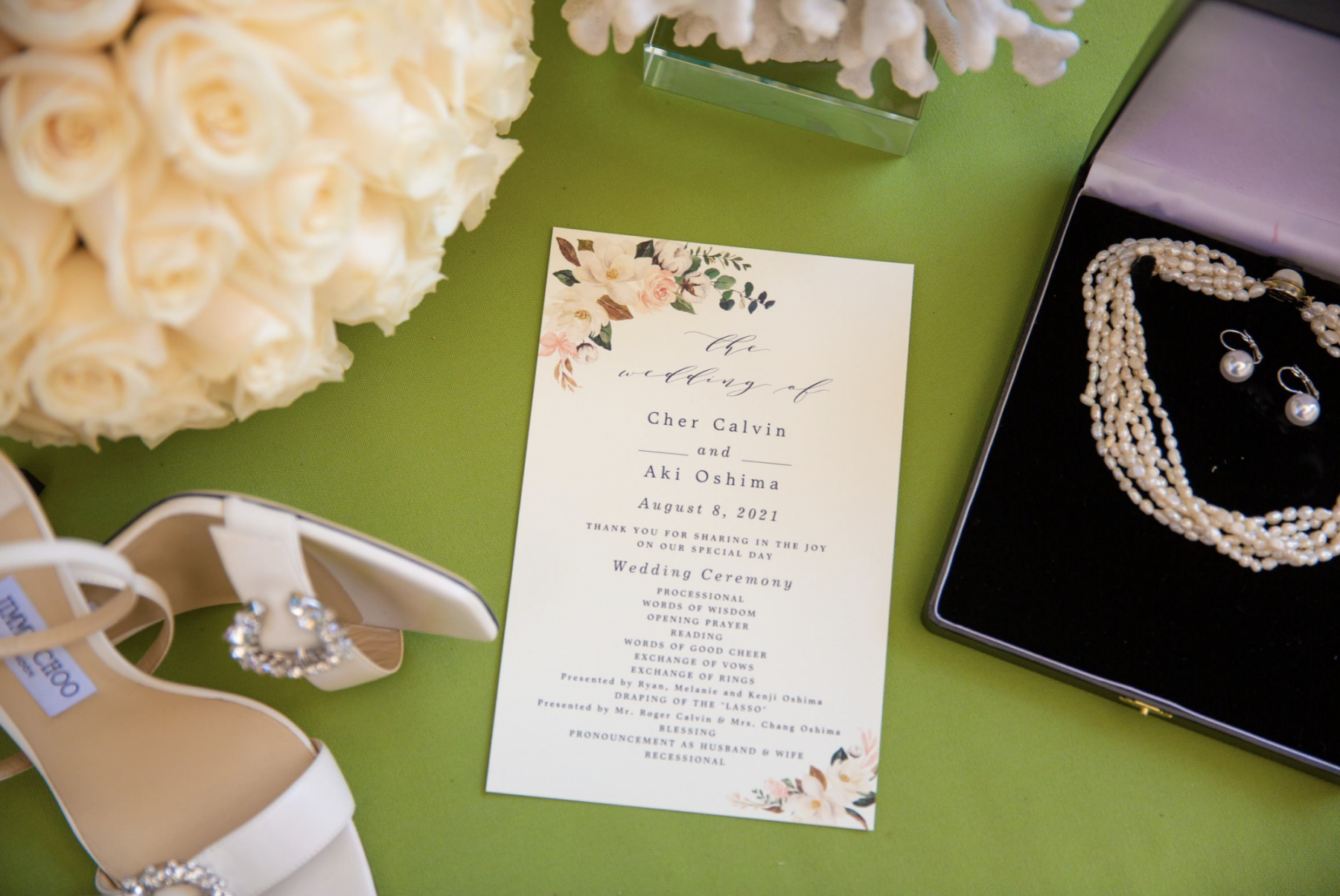 Jimmy Choo bridal shoes, the bouquet, pearls (something borrowed from bridesmaid Mikki Cajucom Sclafani) and the dainty wedding invitation