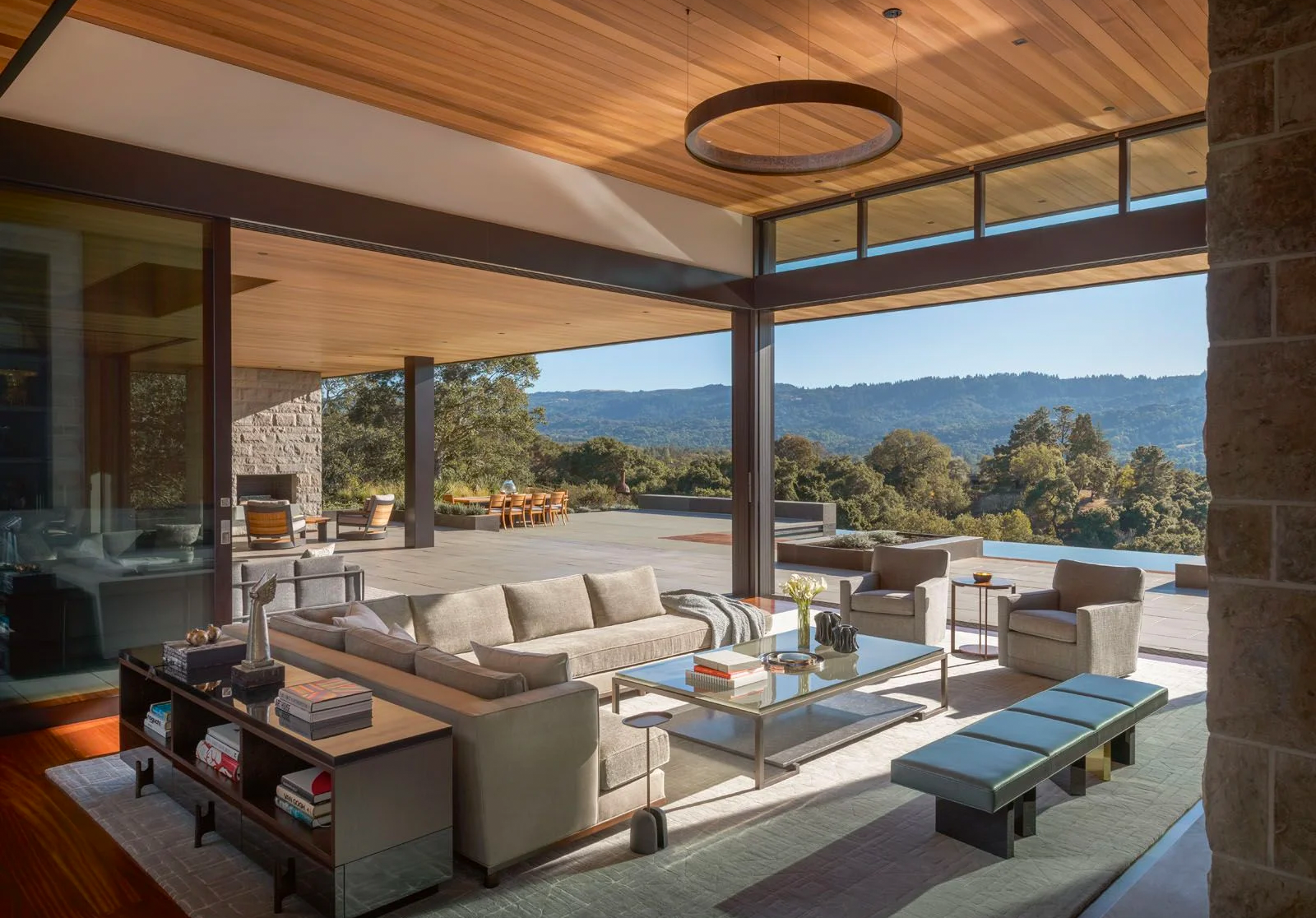 The home promotes indoor-outdoor living with sliding doors that allow for easy entrance into the outdoor spaces (Photography: Aaron Leitz)