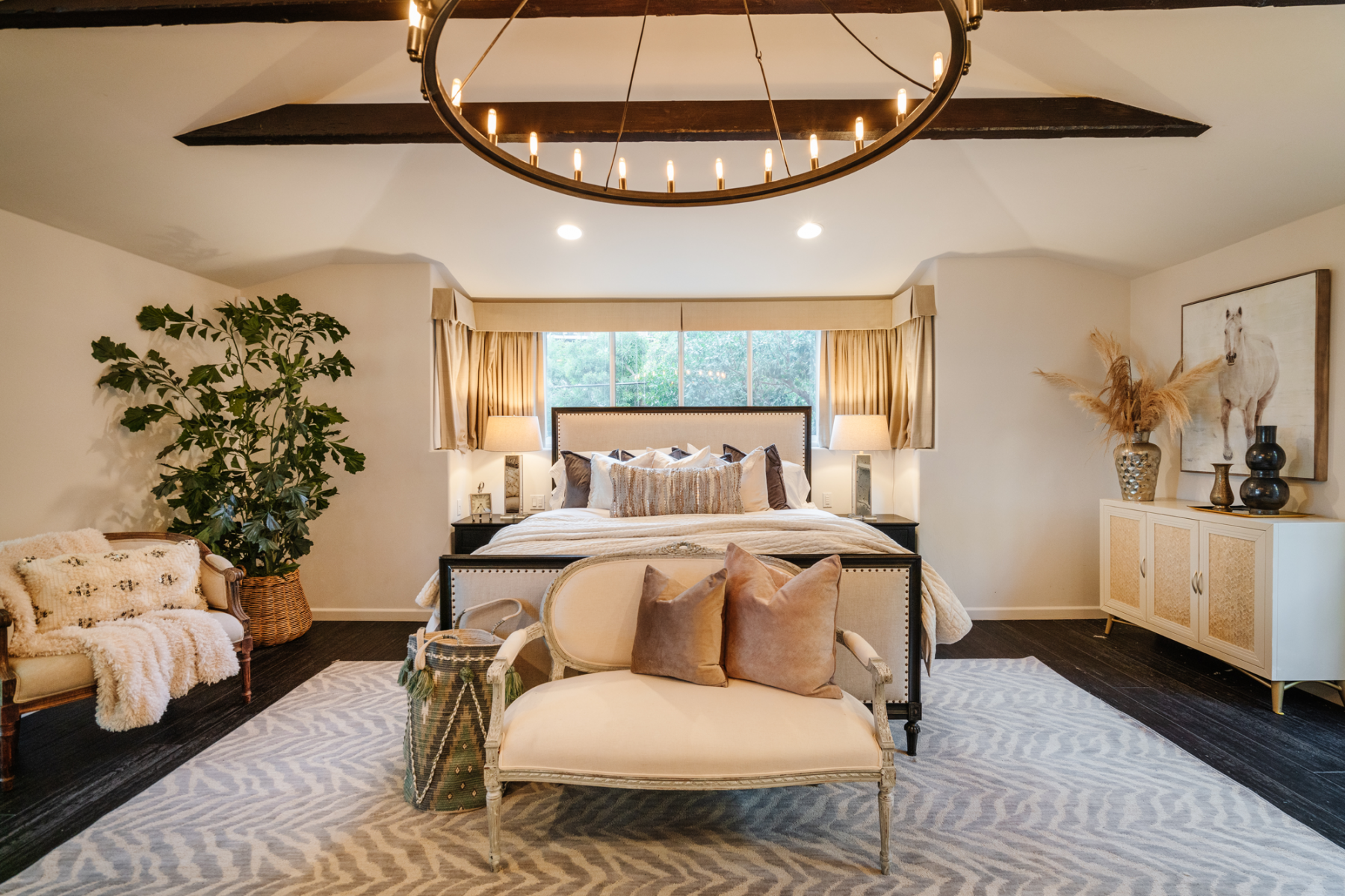 The master bedroom has its personal fireplace, walk-in closet, and a sprawling ensuite