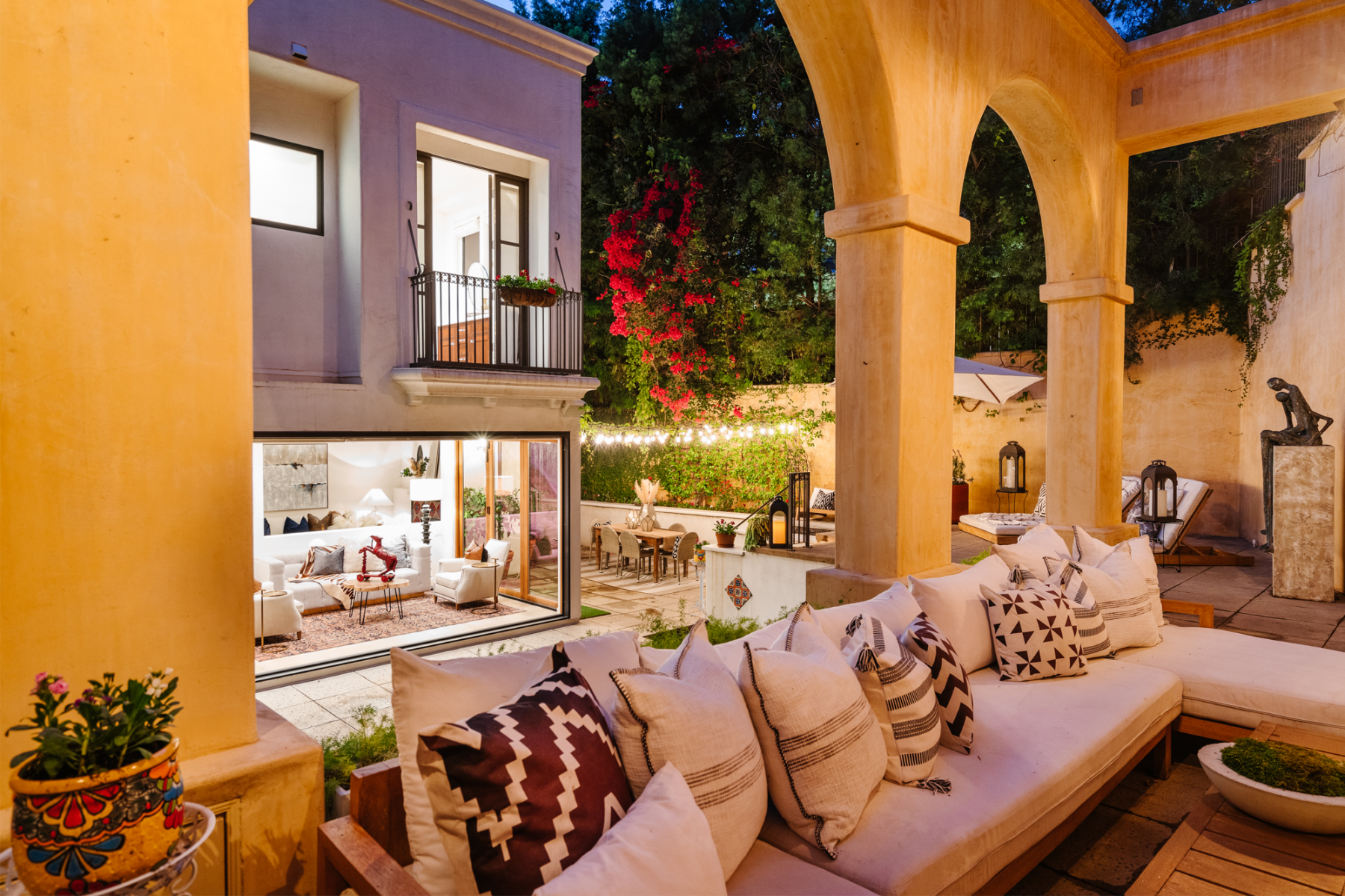 The cosy communal area is furnished with outdoor furniture perfect for intimate gatherings