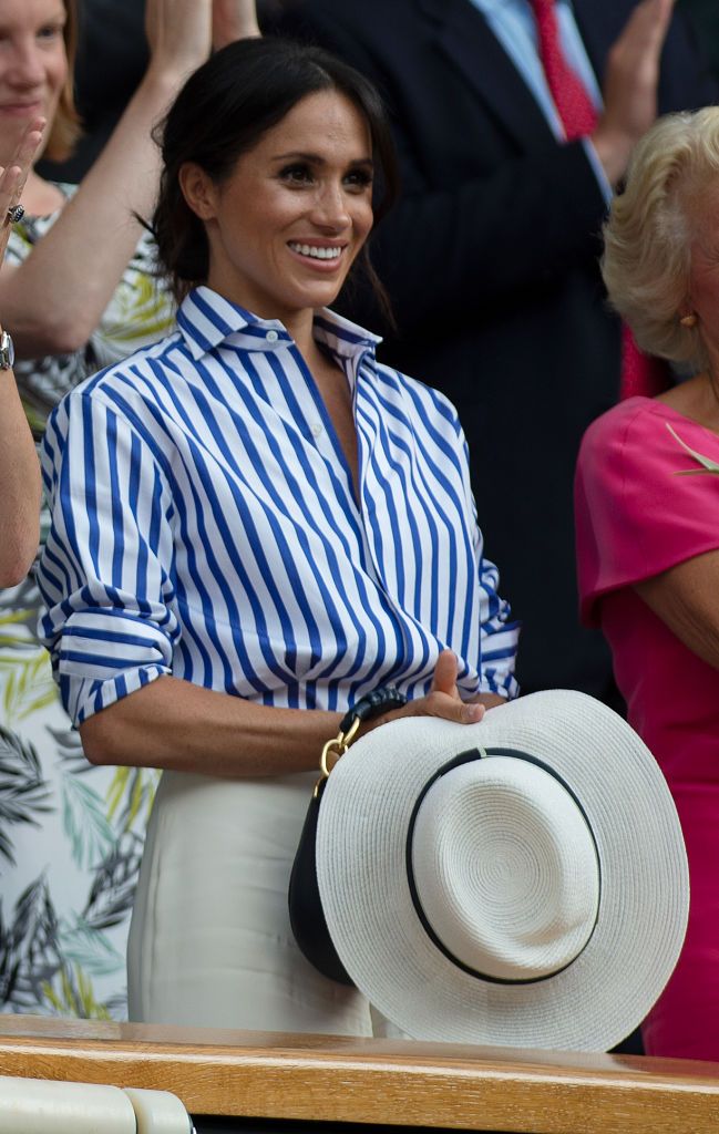 LONDON, ENGLAND - JULY 14: Meghan, Duchess of Sussex attends day twelve of the Wimbledon Lawn Tennis Championships at the All England Lawn Tennis and Croquet Club on July 14, 2018 in London, England. (Photo by Visionhaus/Corbis via Getty Images)