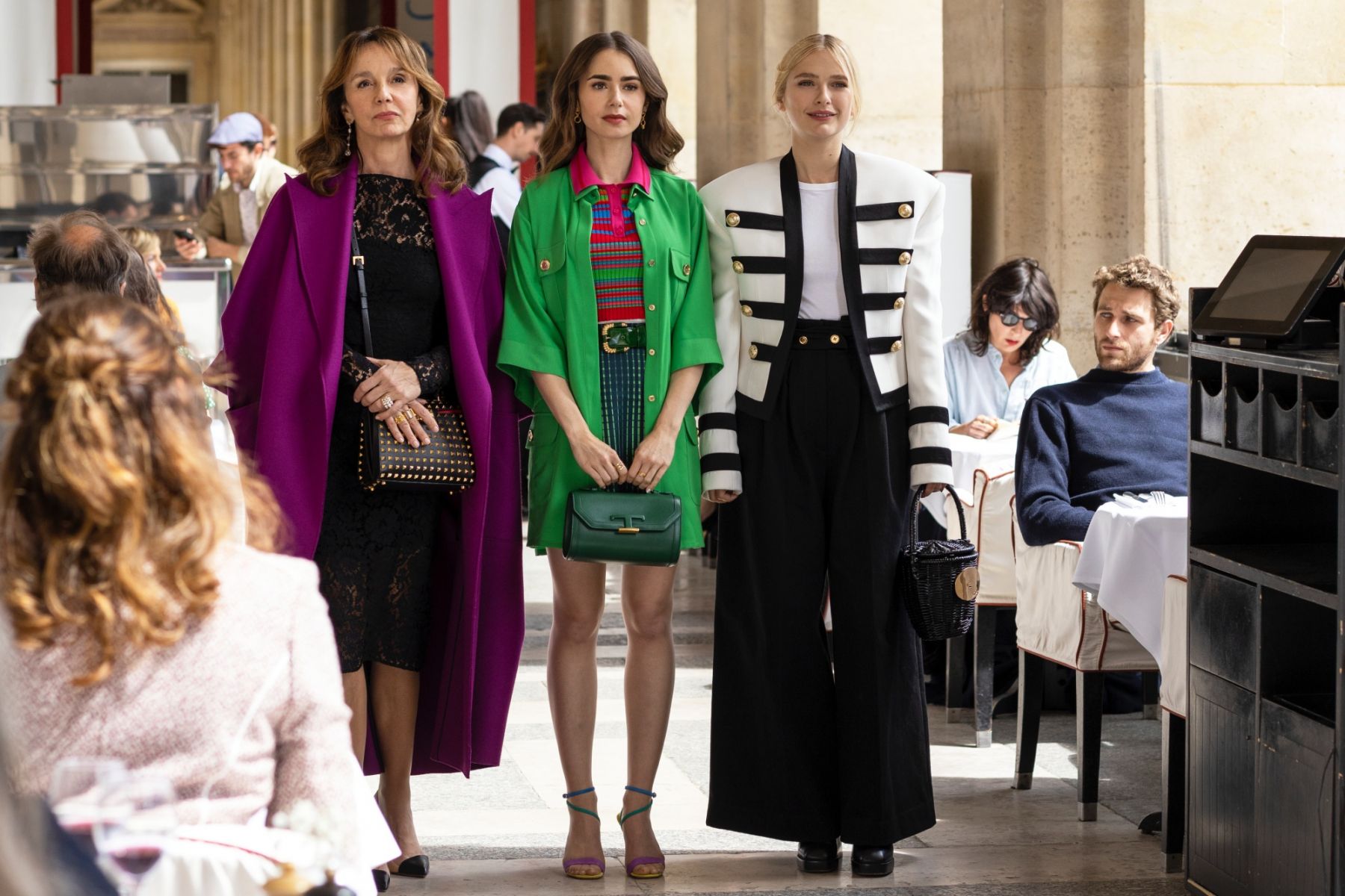 Emily in Paris. (L to R) Philippine Leroy-Beaulieu as Sylvie Grateau, Lily Collins as Emily, Camille Razat as Camille in episode 201 of Emily in Paris. Cr. Carole Bethuel/Netflix Â© 2021