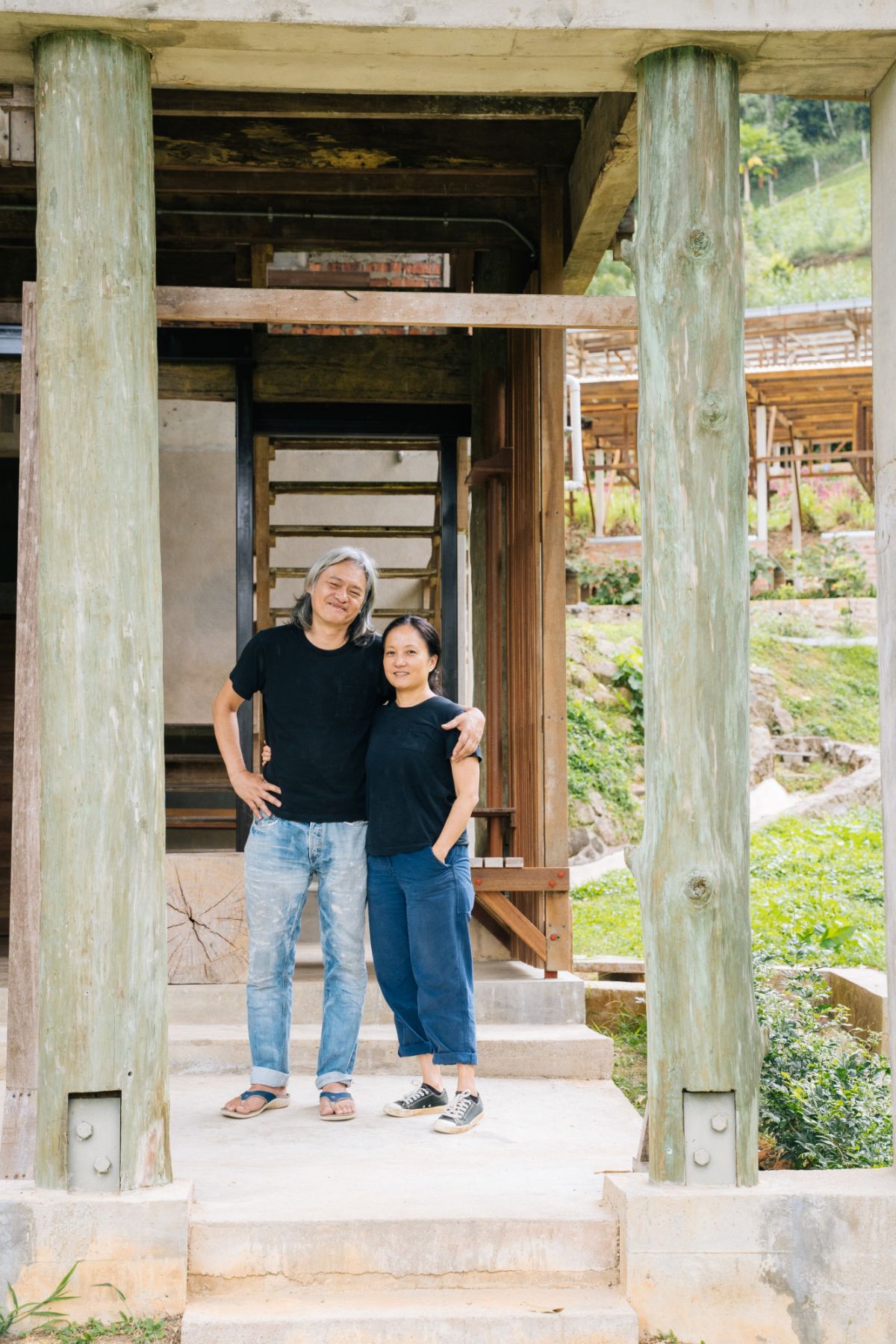 Teo and Ngan at the entrance to the farm