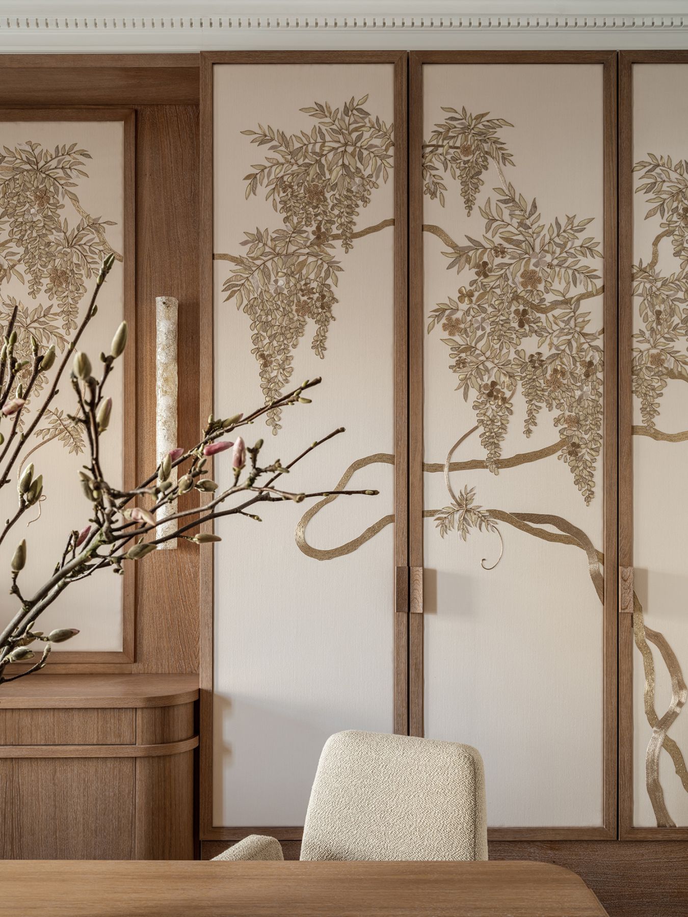 The de Gournay’s Deco Wisteria fabric motifs were embroidered onto a wool sateen