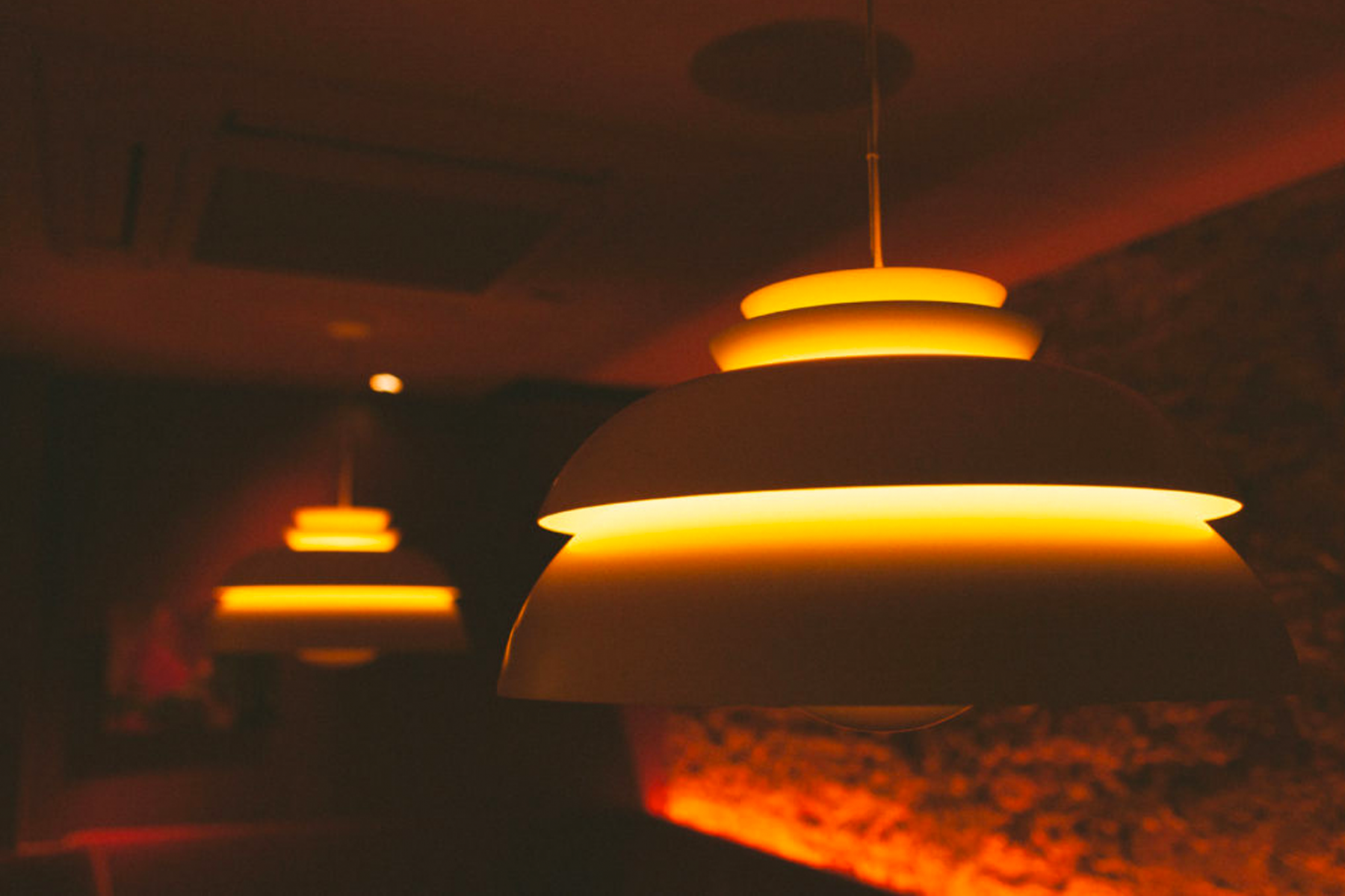 Corduroy Palace features an eclectic mix of furnishings, such as the Fritz Hansen Jørn Utzon pendant lights by Danish architect Utzon (Image: Corduroy Palace)