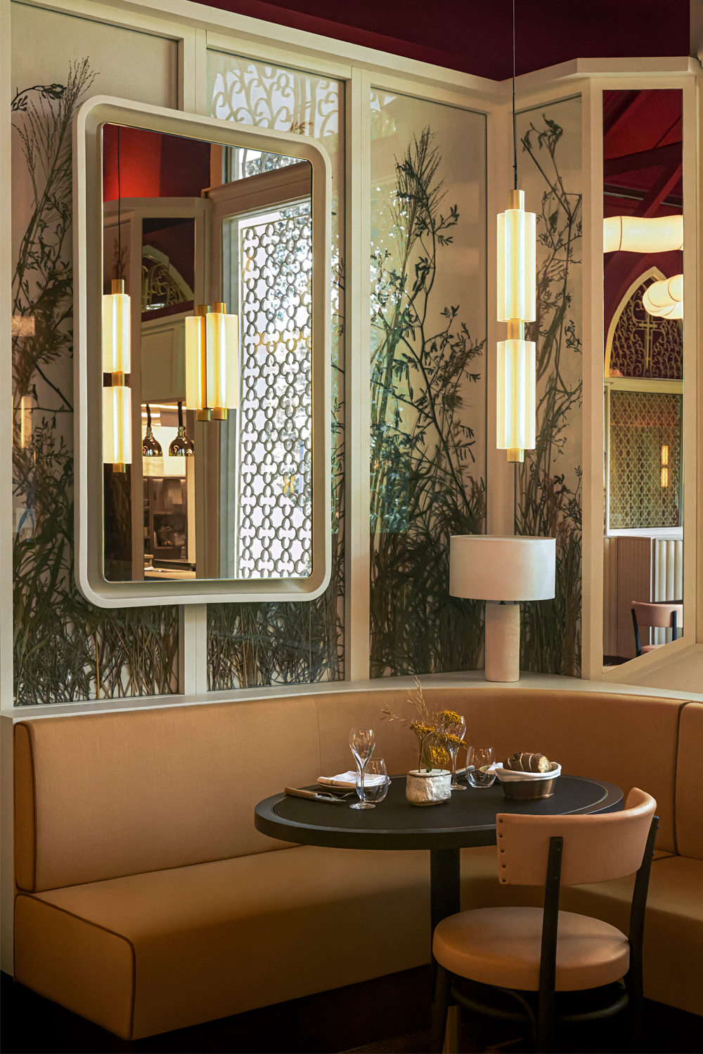 Botanical panels by This Humid House breathe life into the space (Image: Claudine)