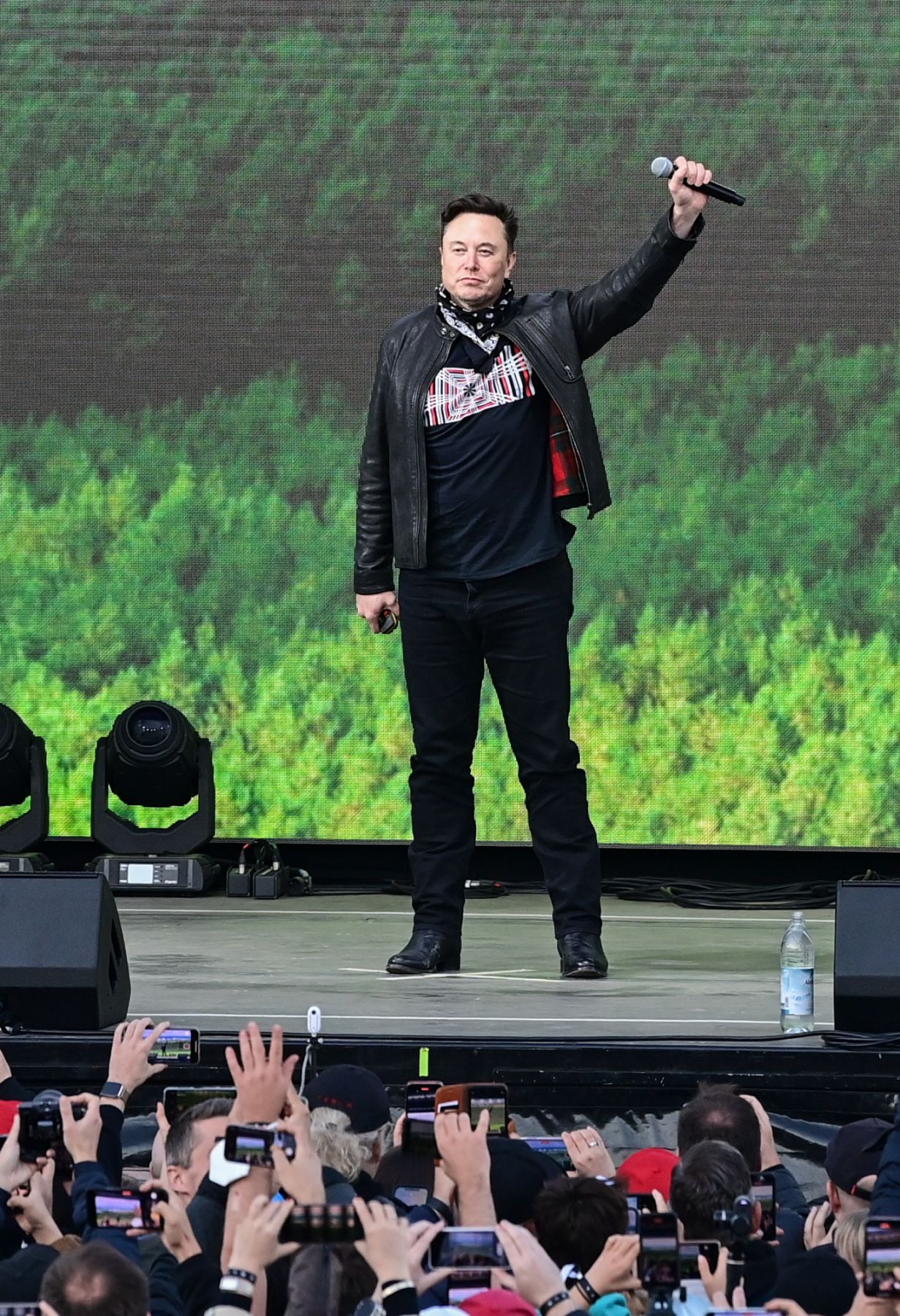 09 October 2021, Brandenburg, Grünheide: Elon Musk, Tesla CEO, stands on a stage at the Tesla Gigafactory for the open day. In Grünheide, east of Berlin, the first vehicles are to roll off the production line from the end of 2021. The US company wants to build around 500,000 Model Ys here every year. Photo: Patrick Pleul/dpa-Zentralbild/dpa (Photo by Patrick Pleul/picture alliance via Getty Images)