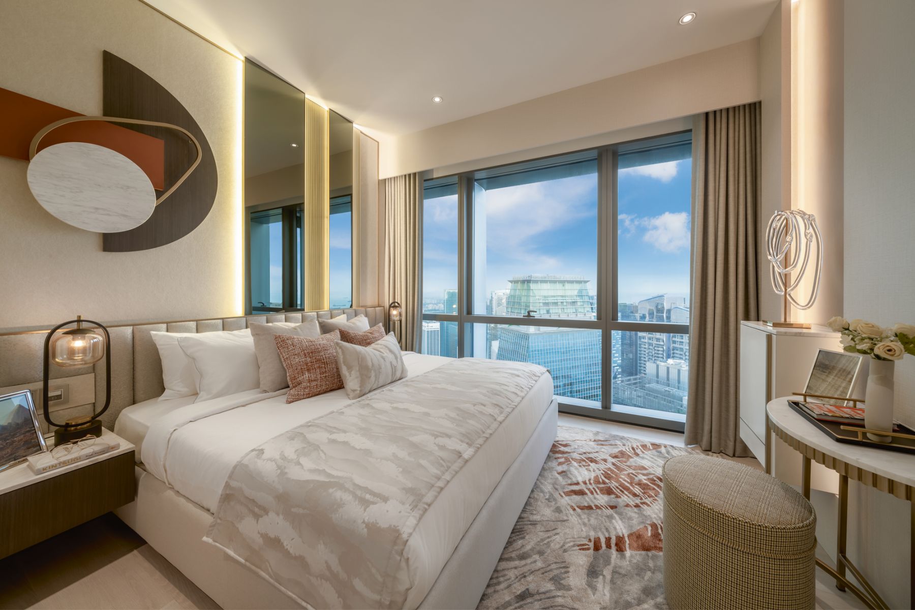 An abstract artwork acts as a focal point in this bedroom