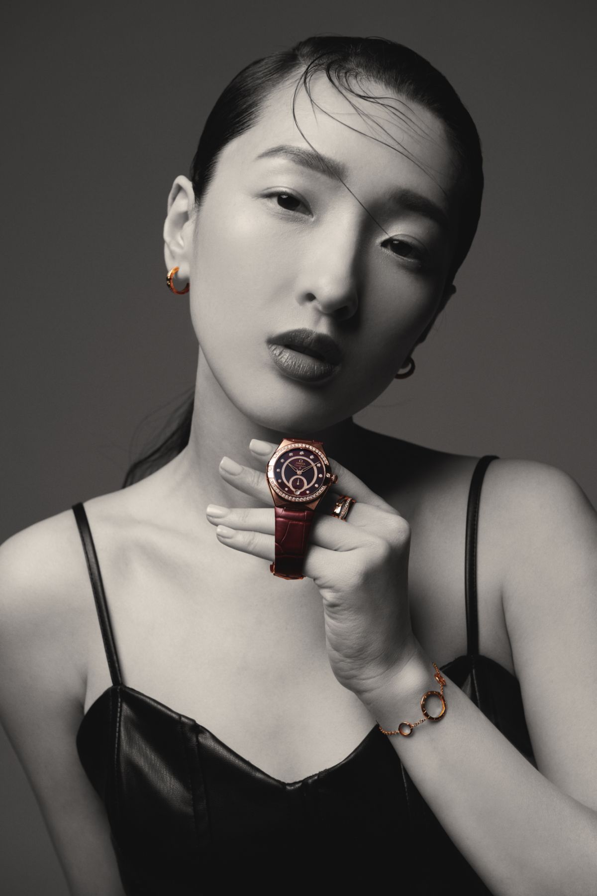 Constellation Small Seconds 34mm watch in Sedna gold on leather strap, Constellation 18k yellow gold earrings with diamonds, Ladymatic 18k yellow ring with diamonds and Constellation 18k yellow gold bracelet