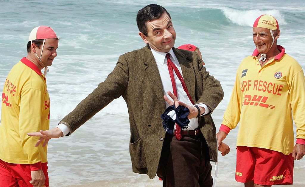 SYDNEY, AUSTRALIA - MARCH 07: Actor Rowan Atkinson in character as Mr Bean arrives at Bondi Beach to promote his new film "Mr Bean's Holiday" on March 7, 2007 in Sydney, Australia. The film will open in cinemas in Australia on March 29.(Photo by Lisa Maree Williams/Getty Images)