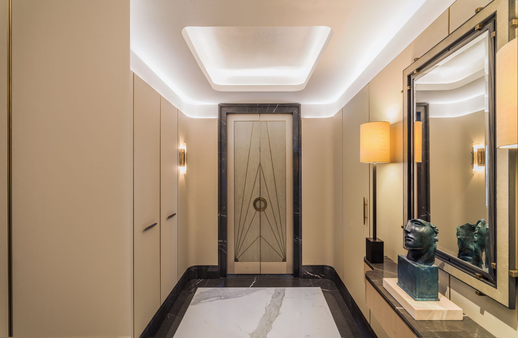 The entrance hall references superyachts with its soothing colour scheme and gentle curves