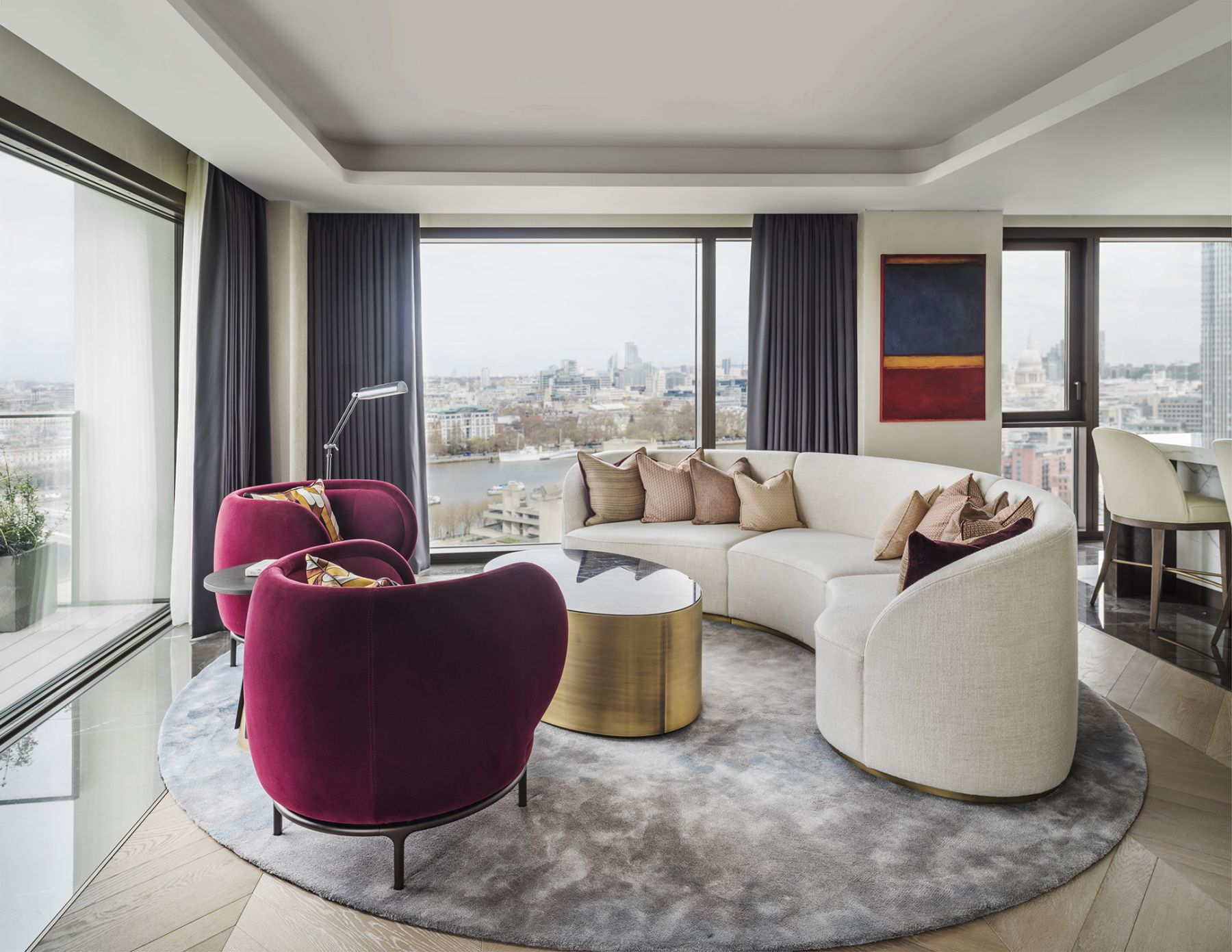 The formal living room boasts views of the London cityscape