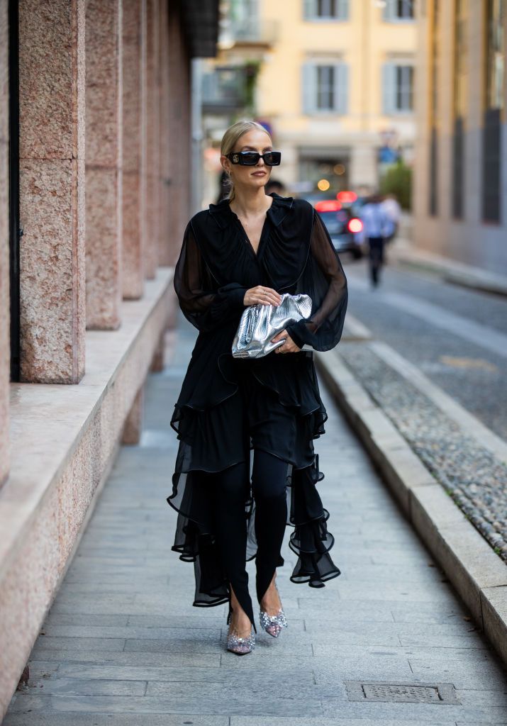 MILAN, ITALY - SEPTEMBER 22: Leonie Hanne is seen wearing black dress, silver Bottega Veneta bag outside Alberta Ferretti during the Milan Fashion Week - Spring / Summer 2022 on September 22, 2021 in Milan, Italy. (Photo by Christian Vierig/Getty Images)