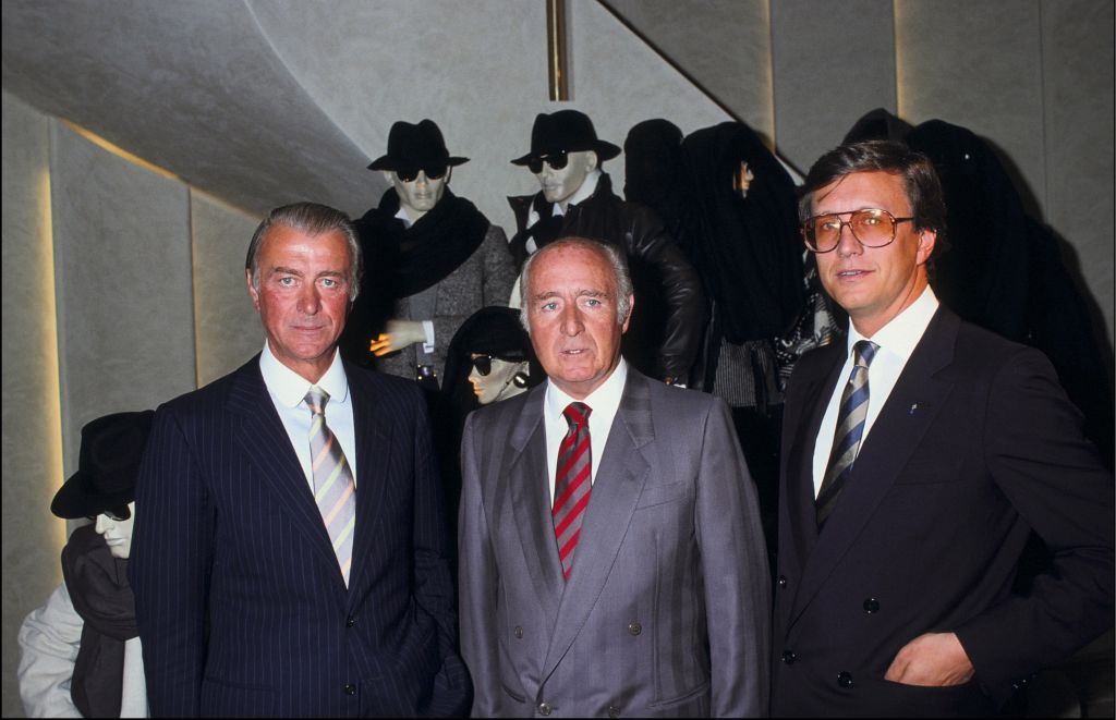 FRANCE - SEPTEMBER 22: Roberto Gucci, Georgio Gucci and Maurizio Gucci at a new store of Gucci in Paris,France on September 22th,1983. (Photo by Laurent MAOUS/Gamma-Rapho via Getty Images)