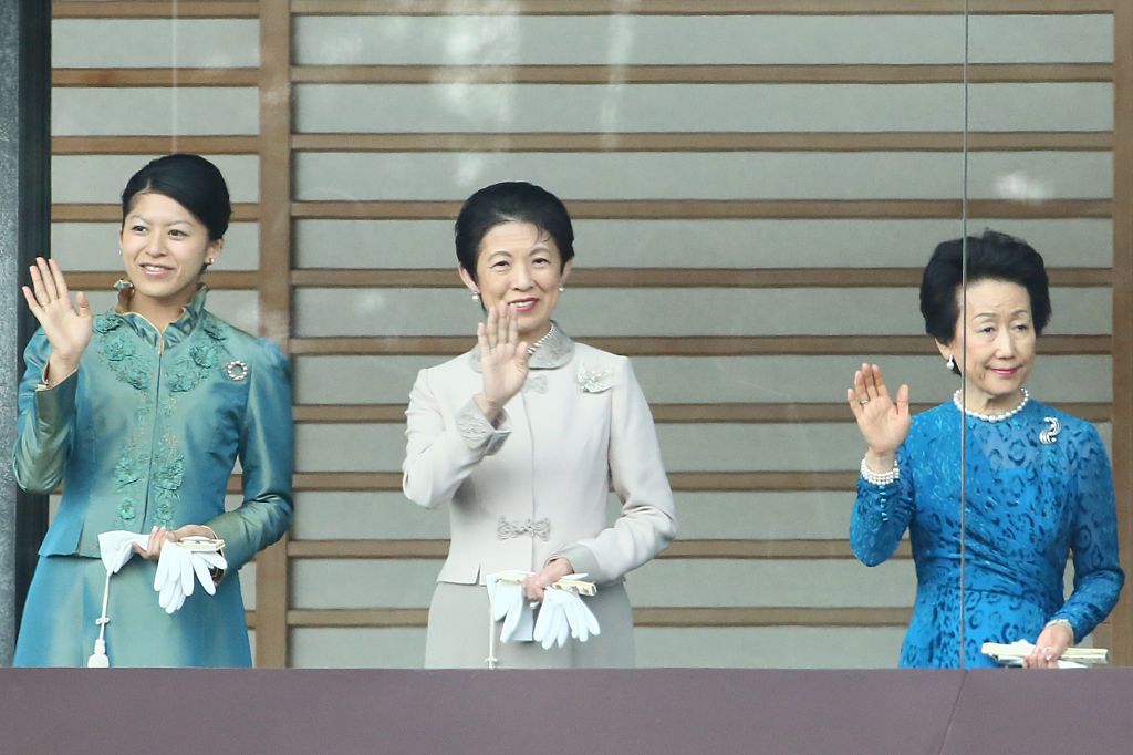 TOKYO, JAPAN - JANUARY 02: (L-R) Princess Tsuguko, Princess Hisako of Takamado and Princess Hanako of Hitachi wave to well-wishers during the celebration for the New Year on the veranda of the Imperial Palace on January 2, 2015 in Tokyo, Japan. (Photo by Ken Ishii/Getty Images)