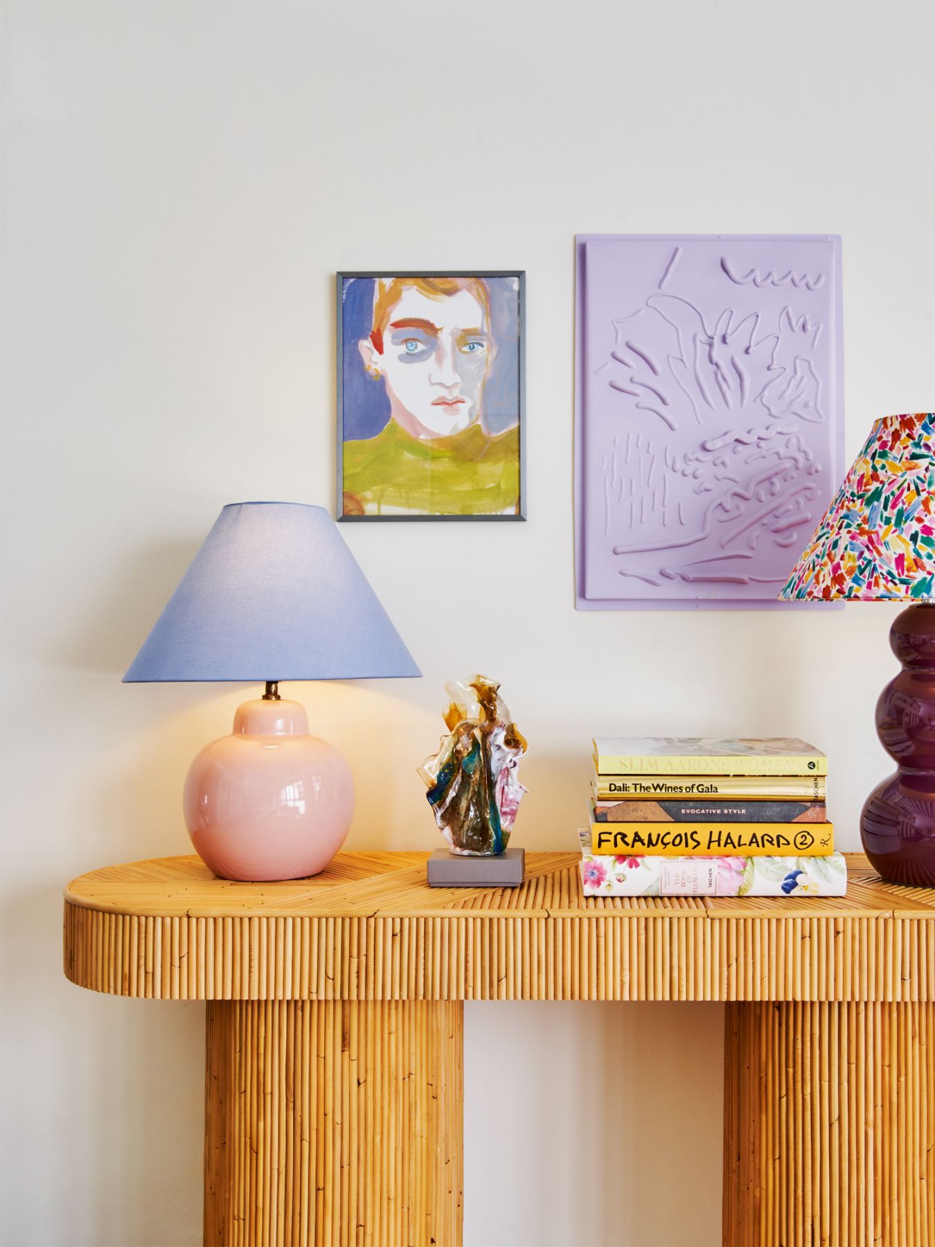 Placed on a console by Australian designer Sarah Ellison are two vintage lamps from Hock Siong & Co, with shades redone in vibrant fabrics