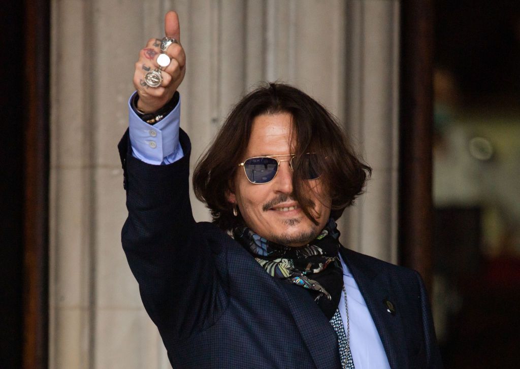 LONDON, ENGLAND - JULY 24: Johnny Depp arrives at the Royal Courts of Justice, Strand on July 24, 2020 in London, England. The Hollywood Actor is suing News Group Newspapers (NGN) and the Sun's executive editor, Dan Wootton, over an article published in 2018 that referred to him as a "wife beater" during his marriage to actor Amber Heard. (Photo by Samir Hussein/WireImage)