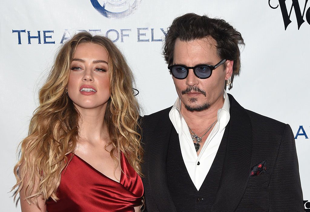 CULVER CITY, CA - JANUARY 09: Amber Heard and Johnny Depp attend The Art of Elysium 2016 HEAVEN Gala presented by Vivienne Westwood & Andreas Kronthaler at 3LABS on January 9, 2016 in Culver City, California. (Photo by C Flanigan/Getty Images)